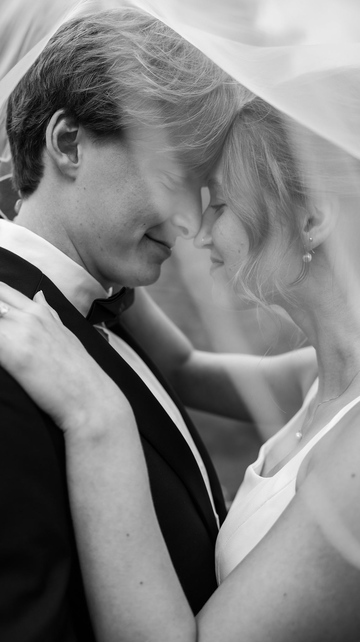 Intimate black and white wedding photography series capturing romantic moments.