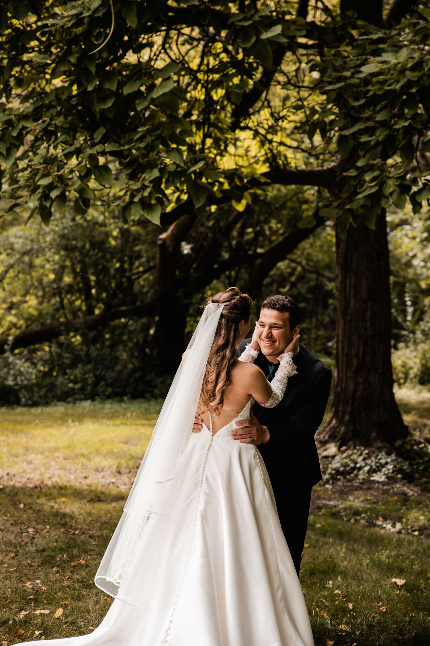 A romantic wedding photo sequence showing a couple in a wooded setting with sunlight filtering through autumn trees.