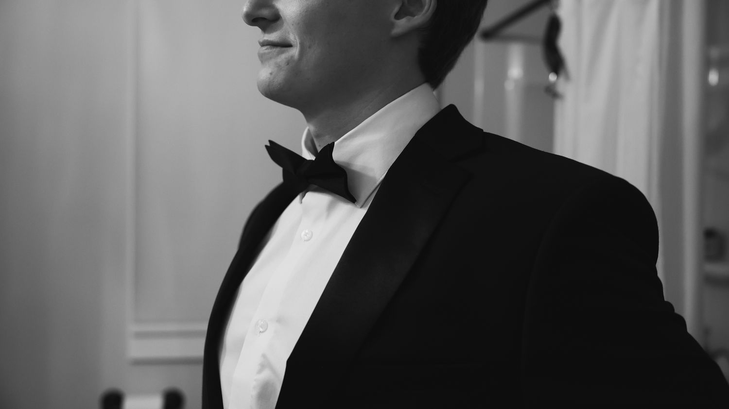 Black and white portrait series showing formal attire and elegant poses.