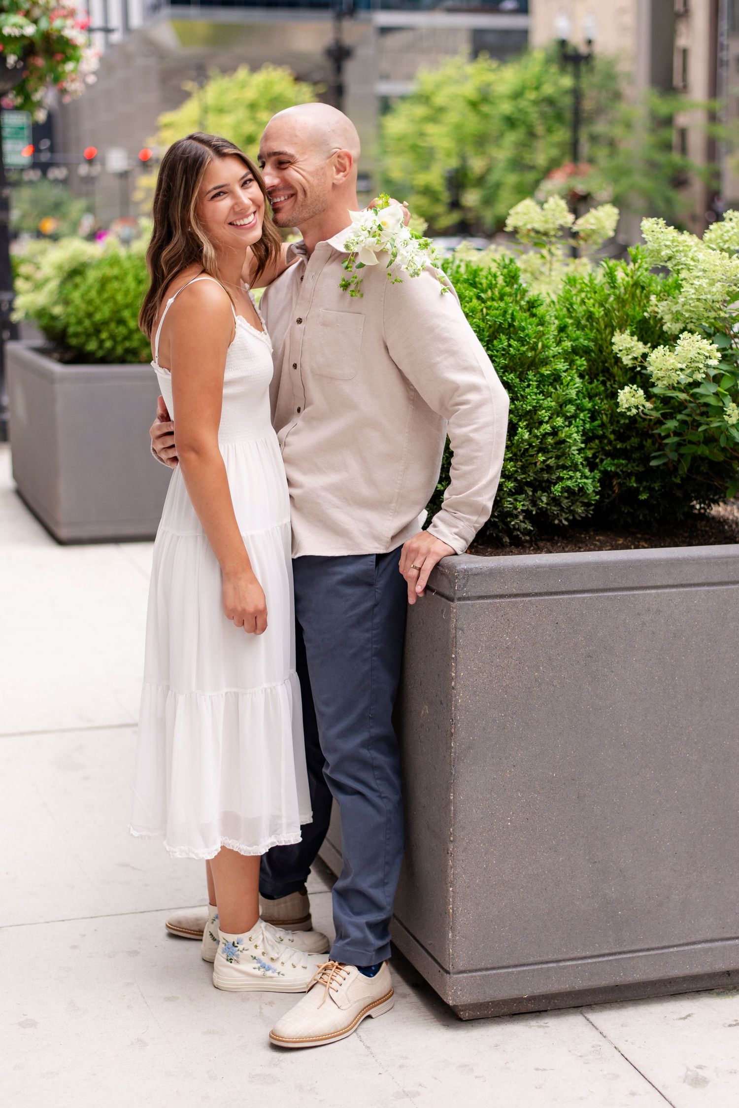 Bride and Groom posing for a photo in downtown city photography session