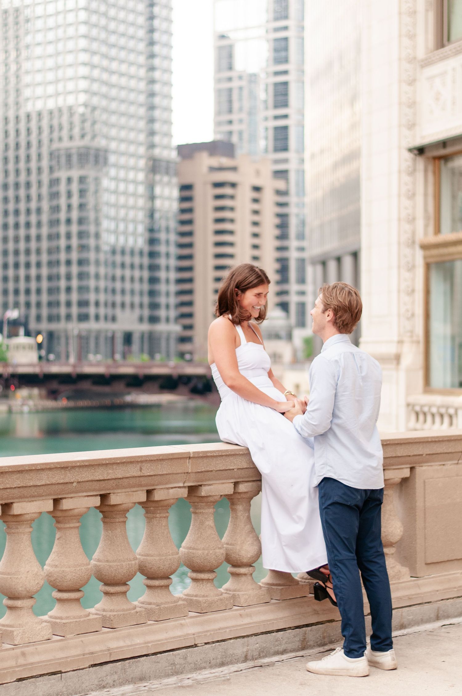Engaged couple holding hands together during Chicago love story photo session