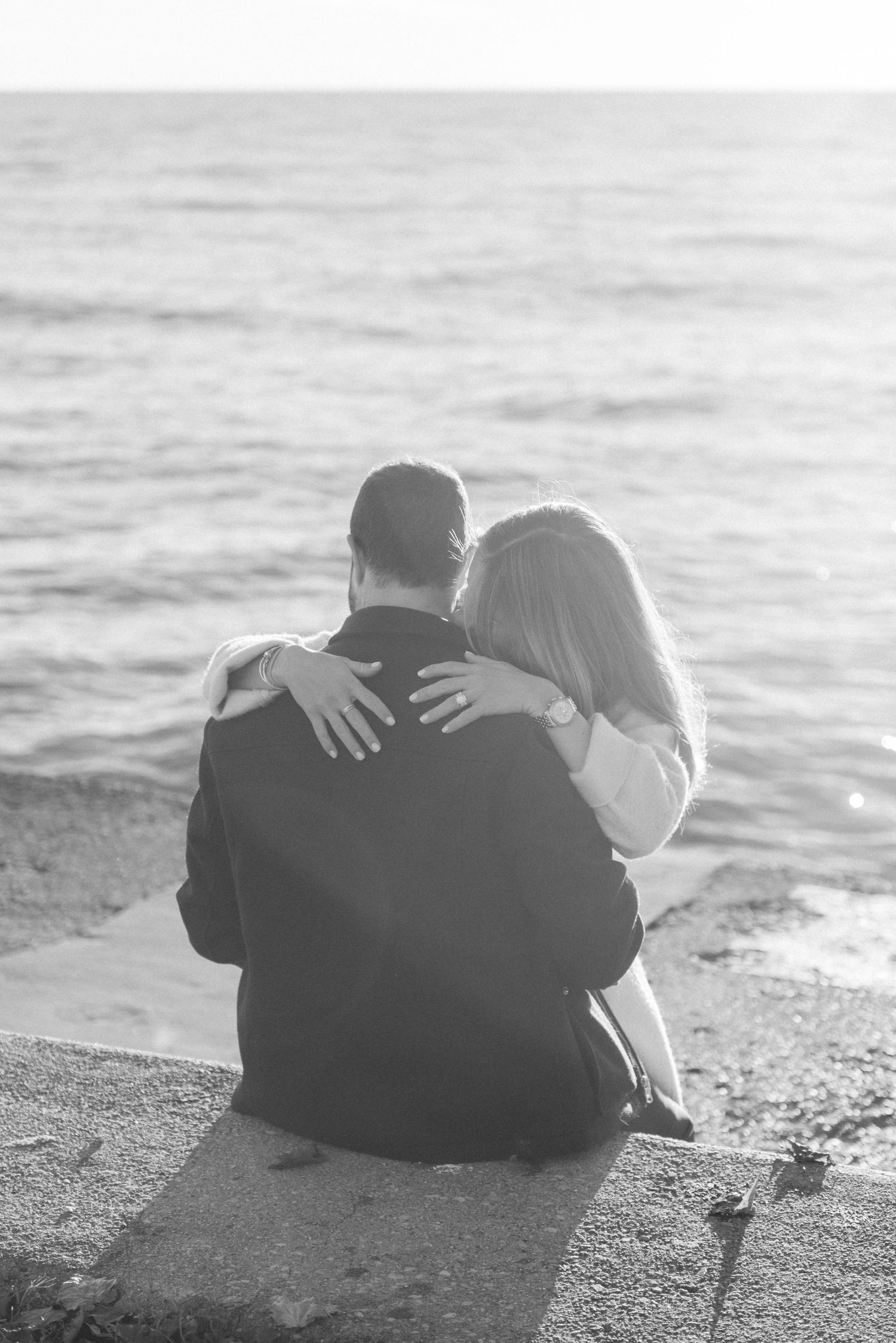 Engaged couple having romantic moments on the Chicago waterfront