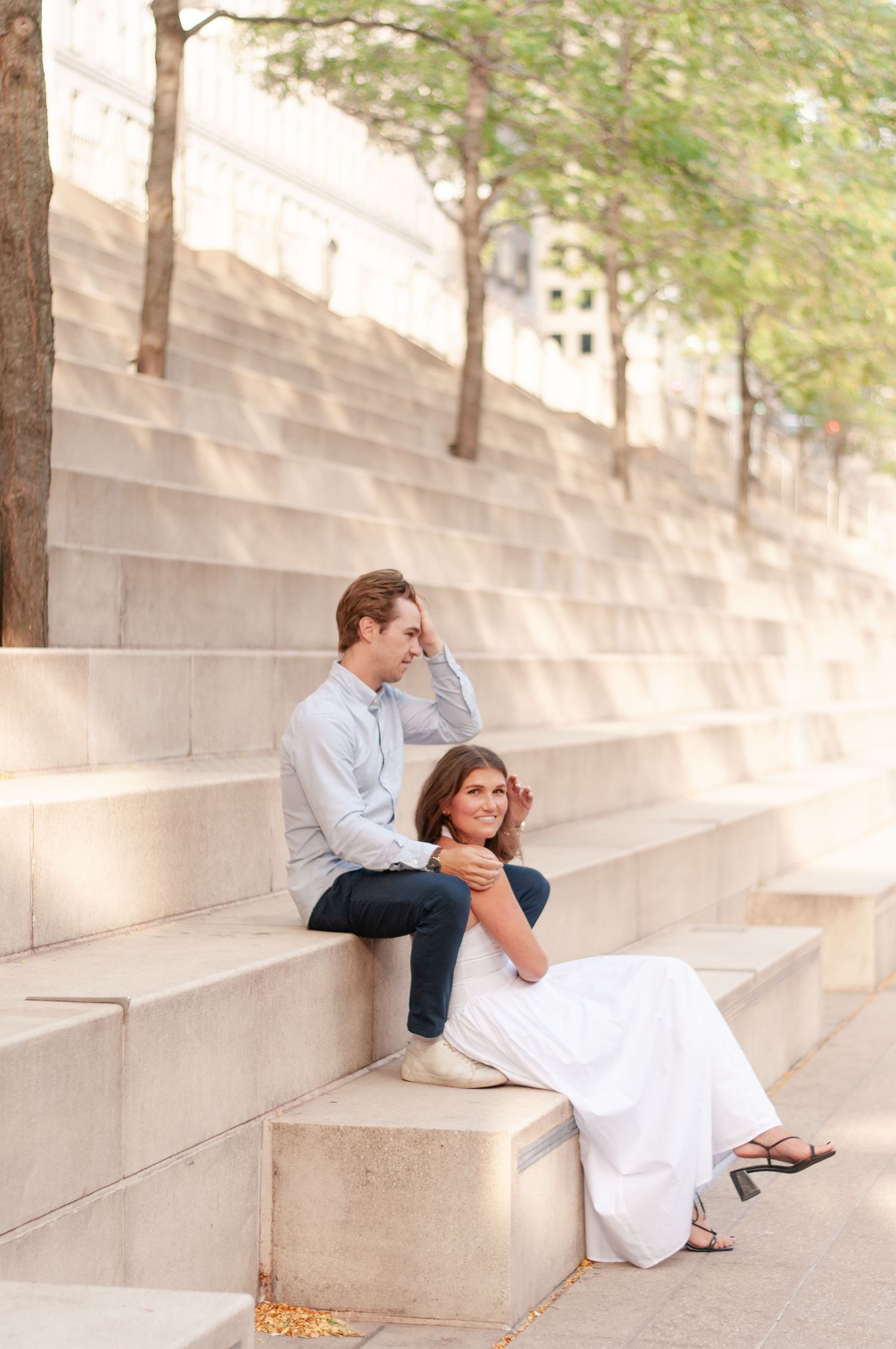 Couple leaning into each other during intimate Chicago riverfront session