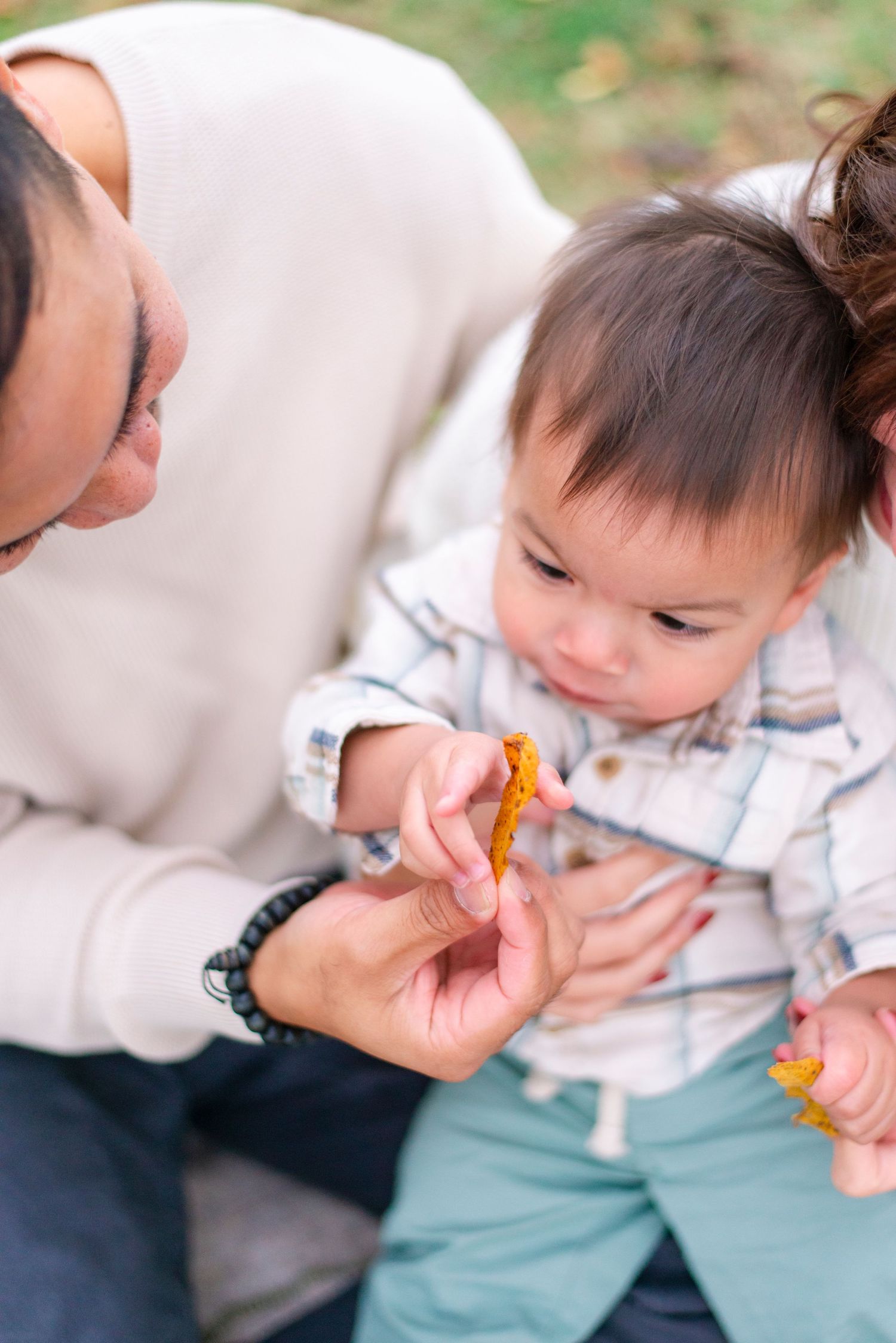 Family laughing together during relaxed Chicago family photography session