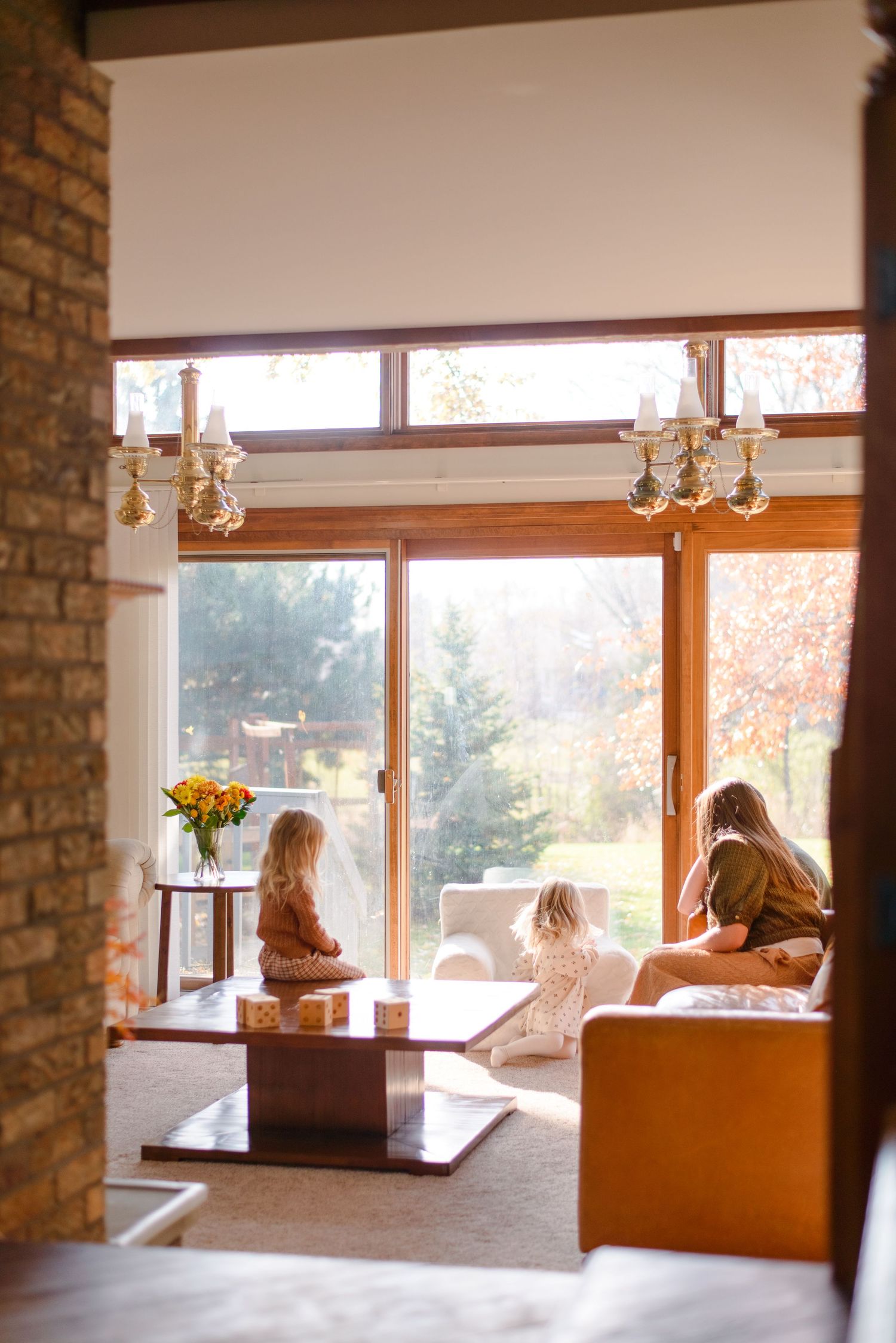 Family conversing during indoor fall family photography session