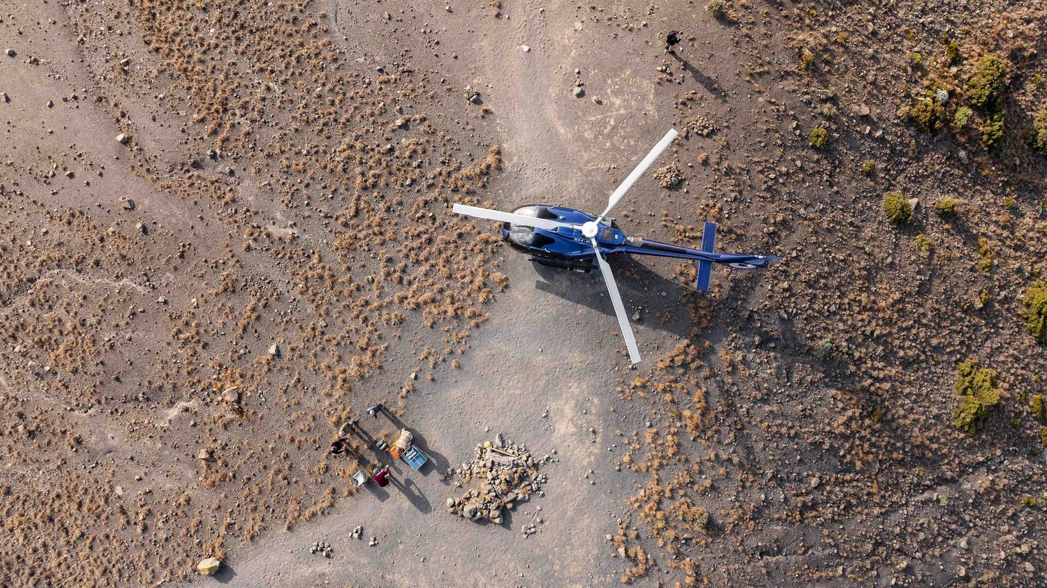 Aerial 8K view of a remote wilderness; professional Tanzania tourism cinematography and licensed drone services.