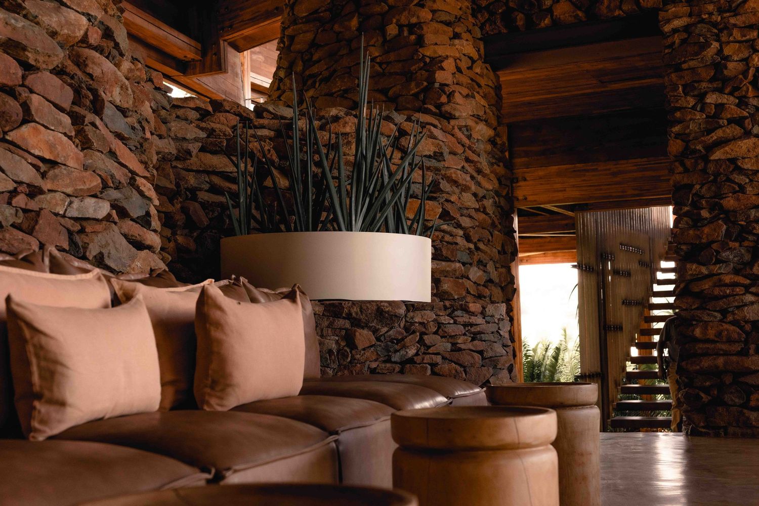Luxury safari lodge cinematography showcasing eco-luxury suite design, captured by hospitality brand storytellers Black Earth Production.
