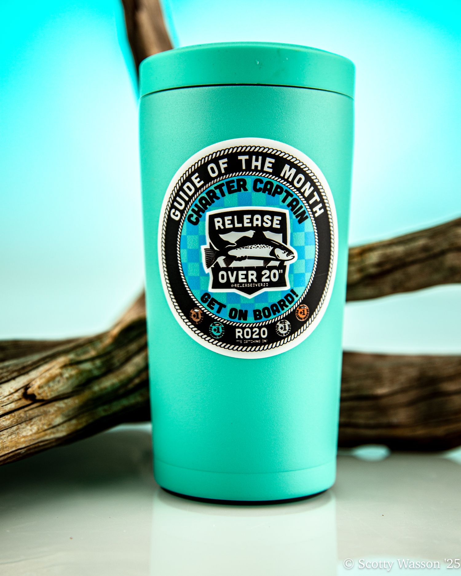 Teal insulated tumbler featuring a Guide of the Month Charter Captain fishing patch with Release Over 20 design.
