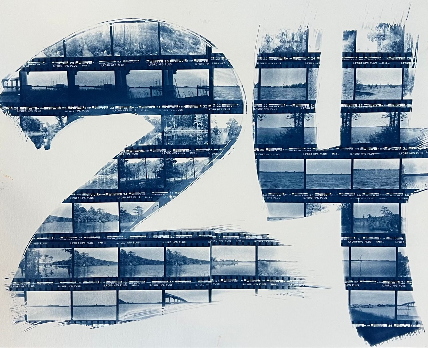 Series of geometric blue cyanotype prints creating an abstract architectural pattern.
