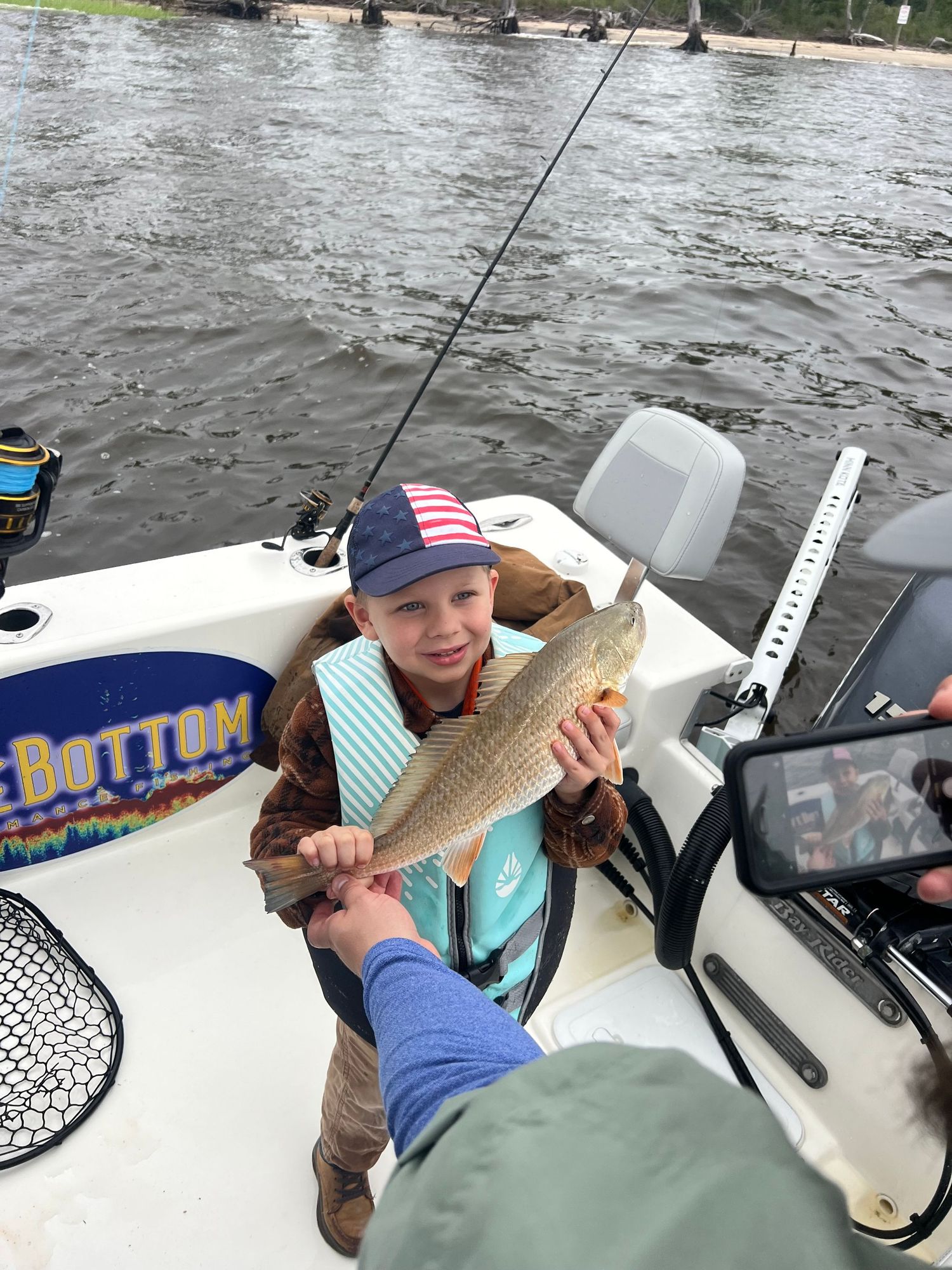 Series of fishing images showing redfish catches from a boat on choppy waters.