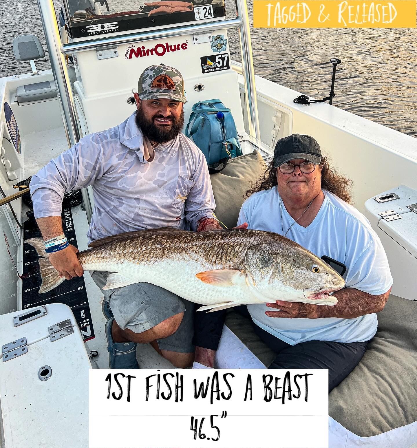 Anglers aboard a MirroCraft boat proudly show off a massive 46.5-inch red drum catch.