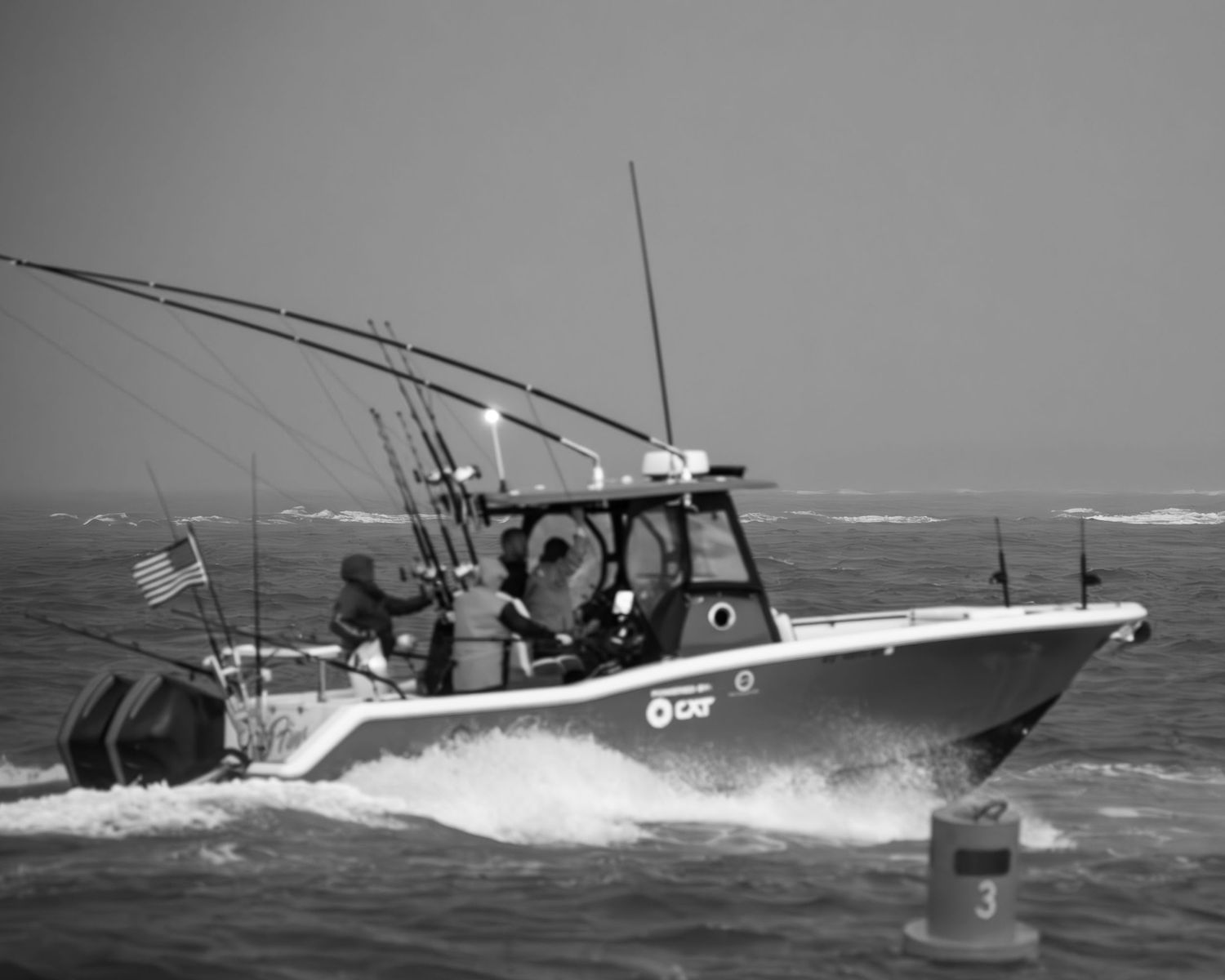 Black and white photo of fishing boats navigating through stormy seas with high waves.