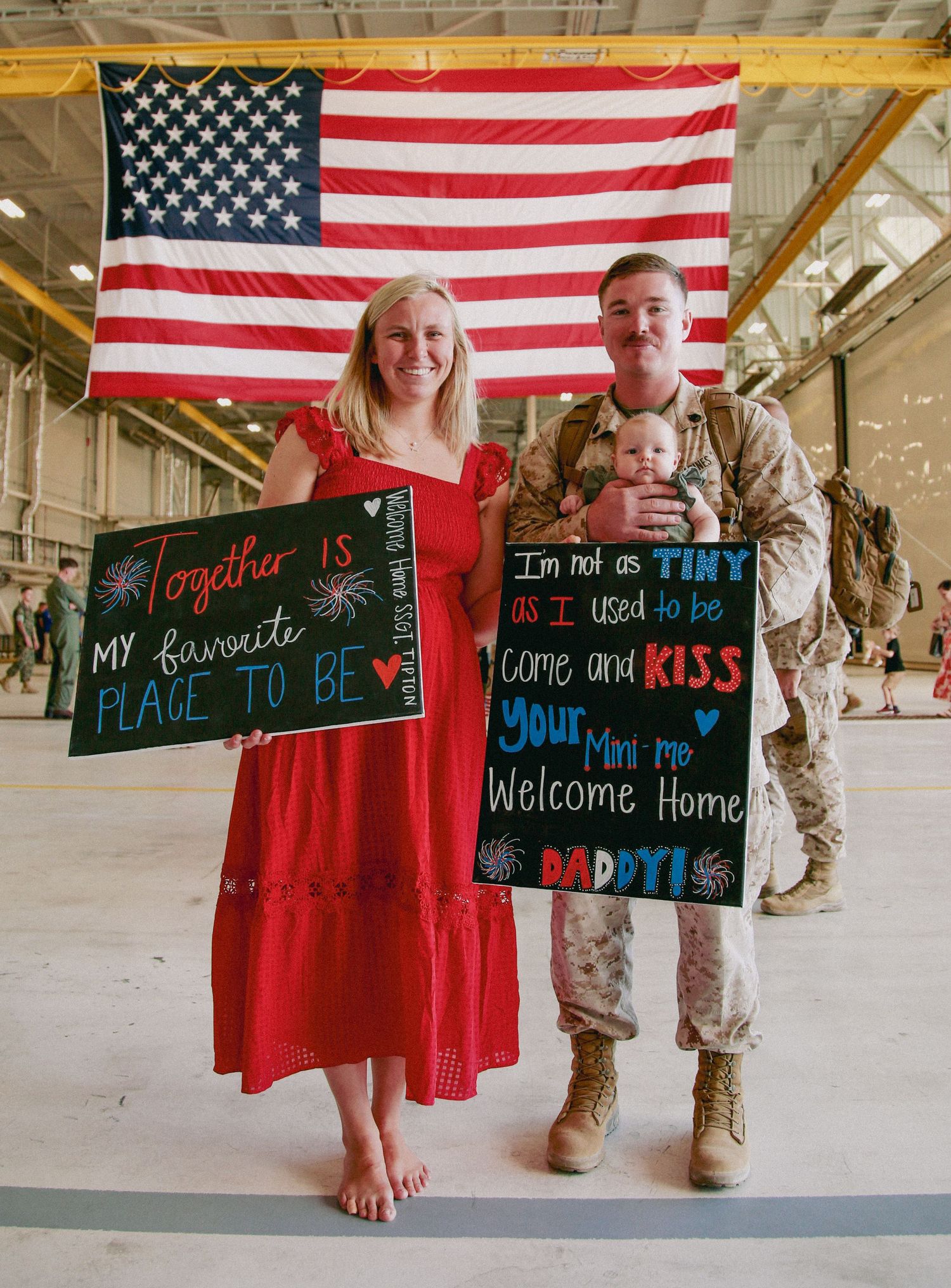 Military homecoming photo series with American flags showing progressive messages on chalkboard signs.