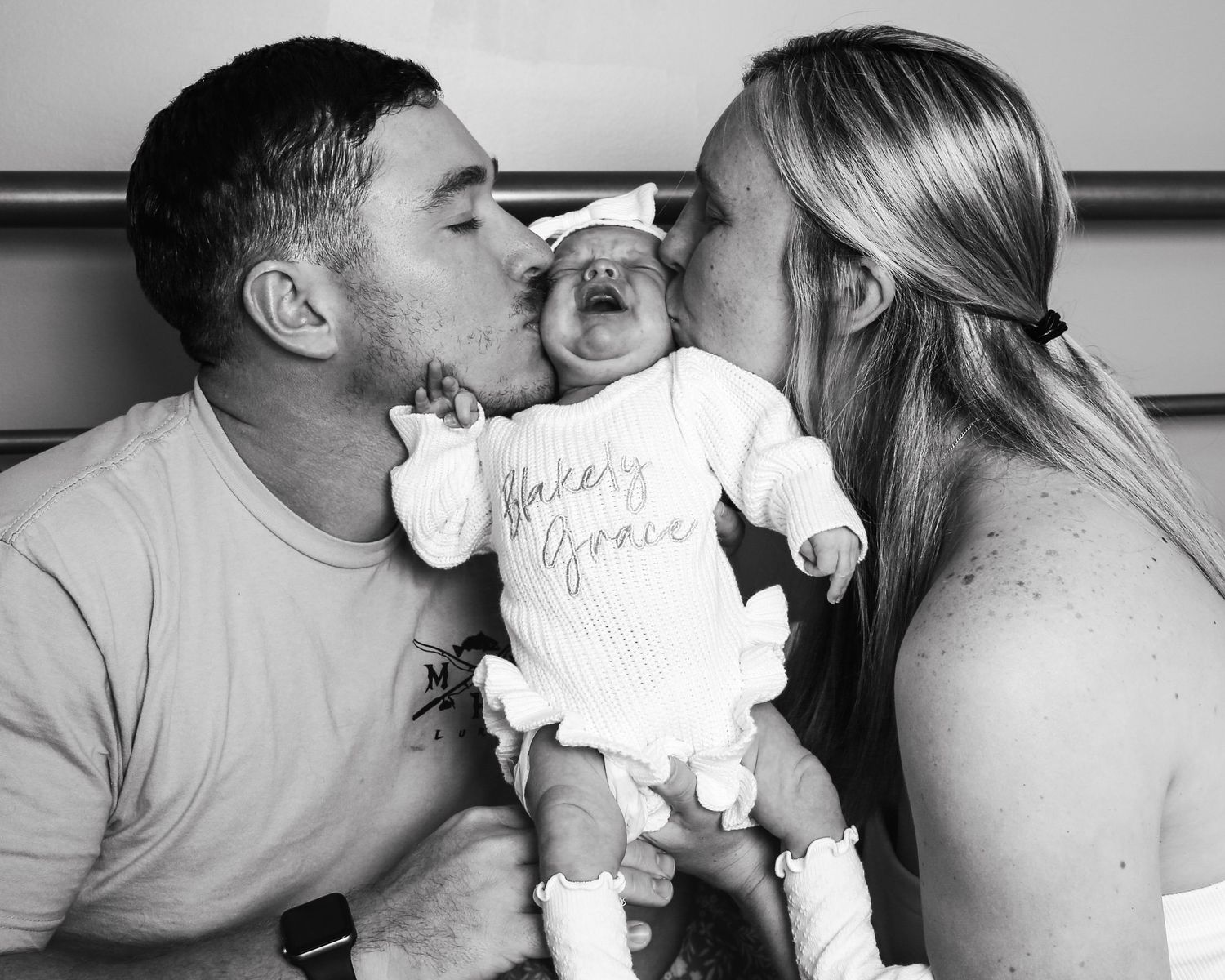 A sequence of tender, romantic moments in black and white photography showing affectionate embraces and kisses.