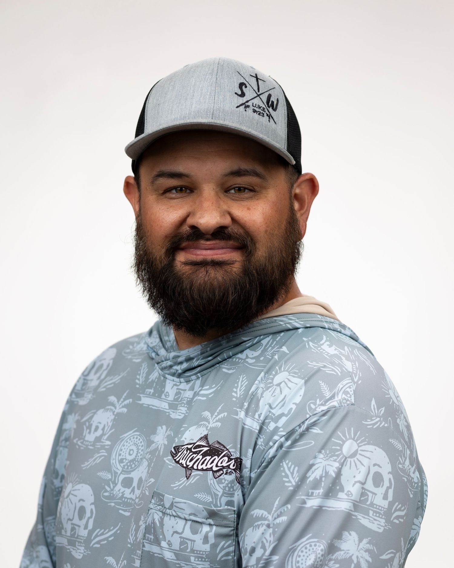 FiSH branded merchandise promotional photo with gray and black color scheme.