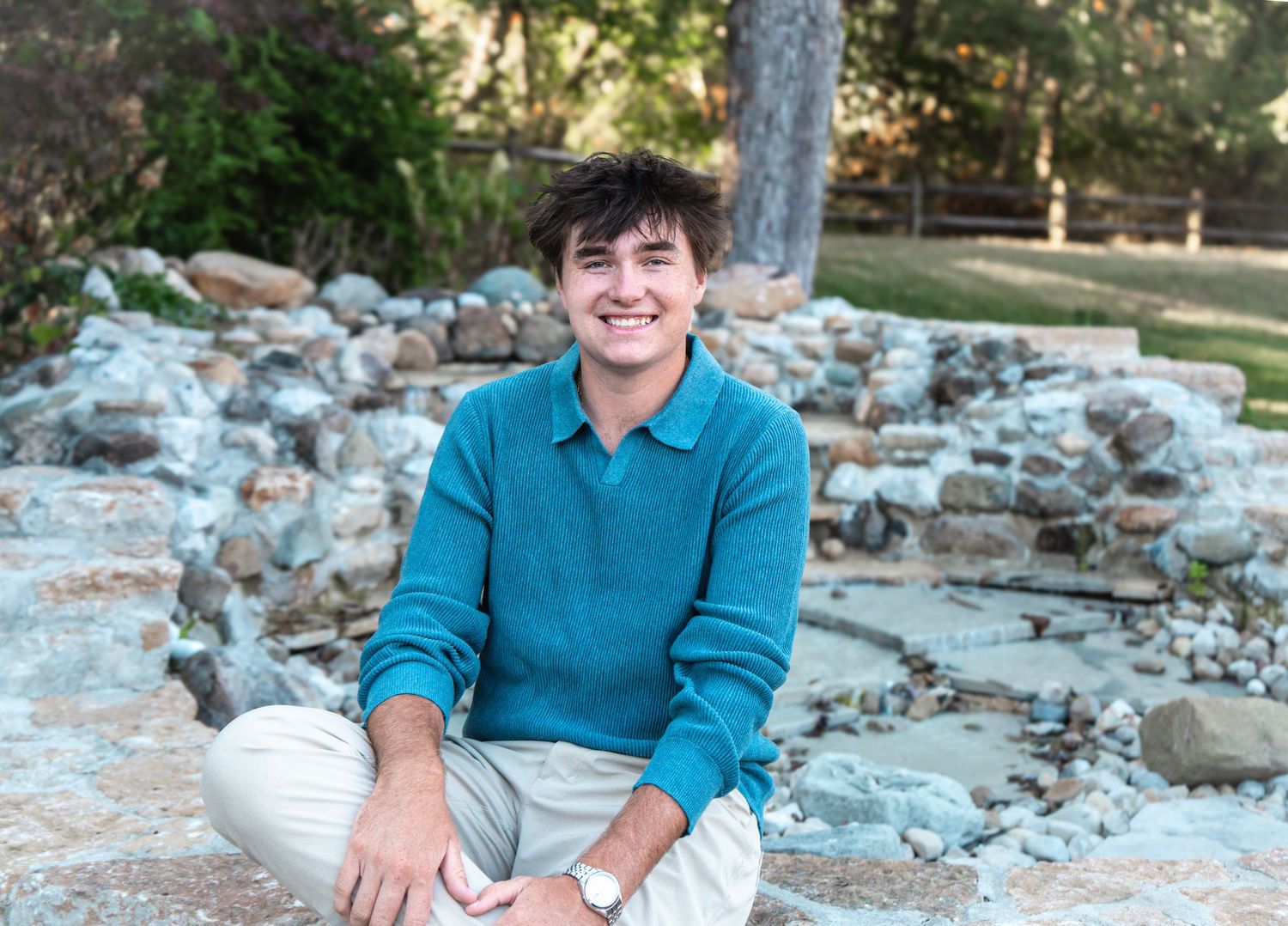 A series of outdoor portraits taken near a rocky landscape with someone wearing a blue sweater and white pants.