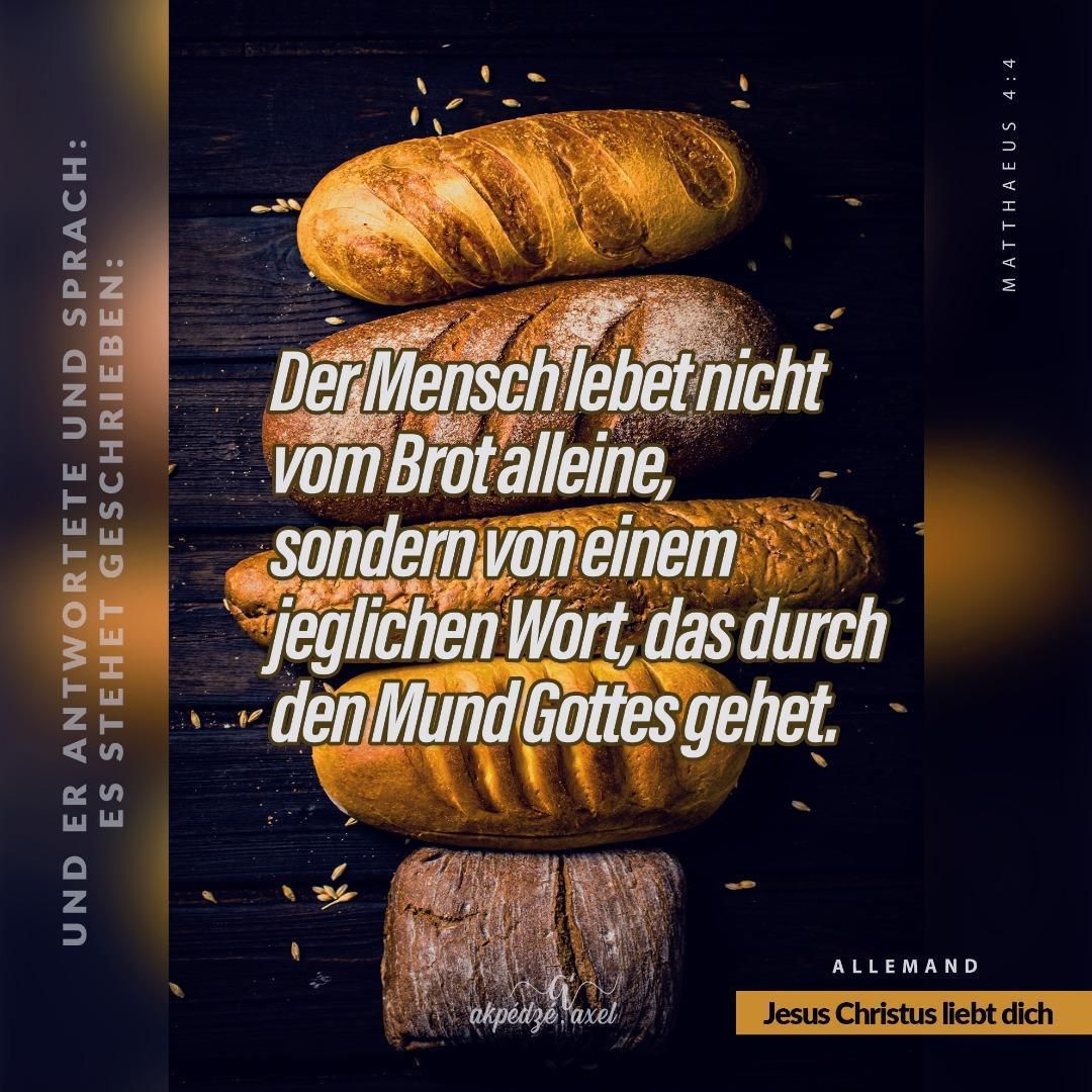 Dark background image showing fresh rustic bread loaves with German biblical verse text overlay about sustenance.