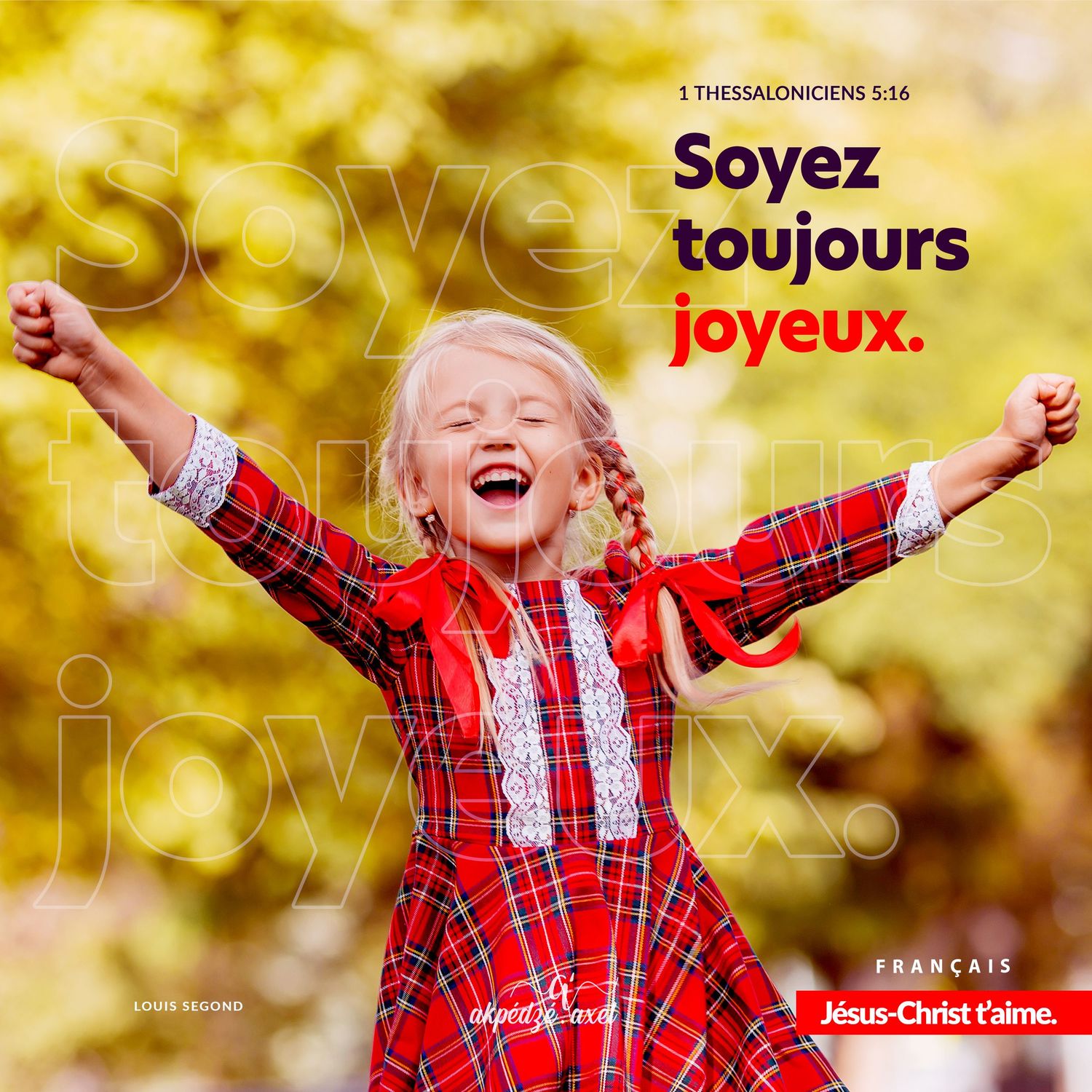 A child in a red plaid dress jumps joyfully with arms raised against a golden bokeh background.