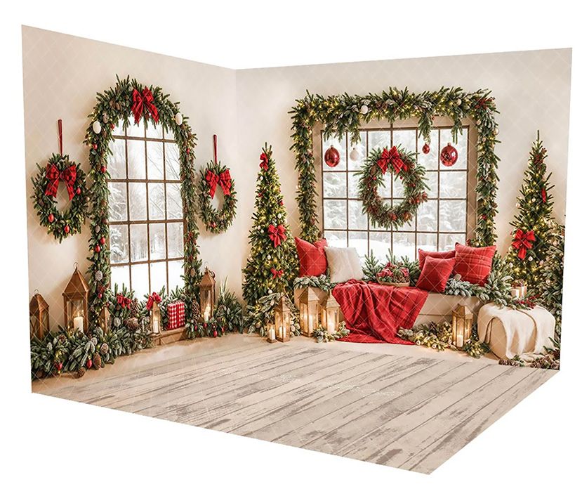 Christmas studio backdrop with windows, wreaths, red bows, and wooden floor decorated with holiday greenery.