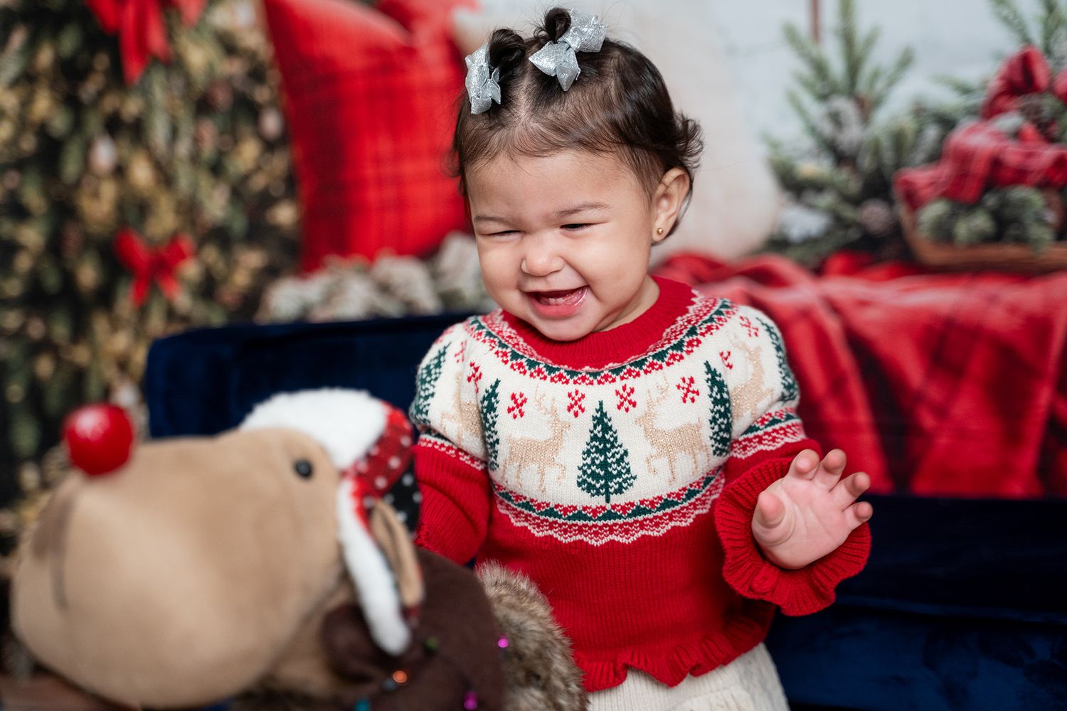 A series of holiday photos showing a festive Christmas scene with red decor and evergreen trees in the background.