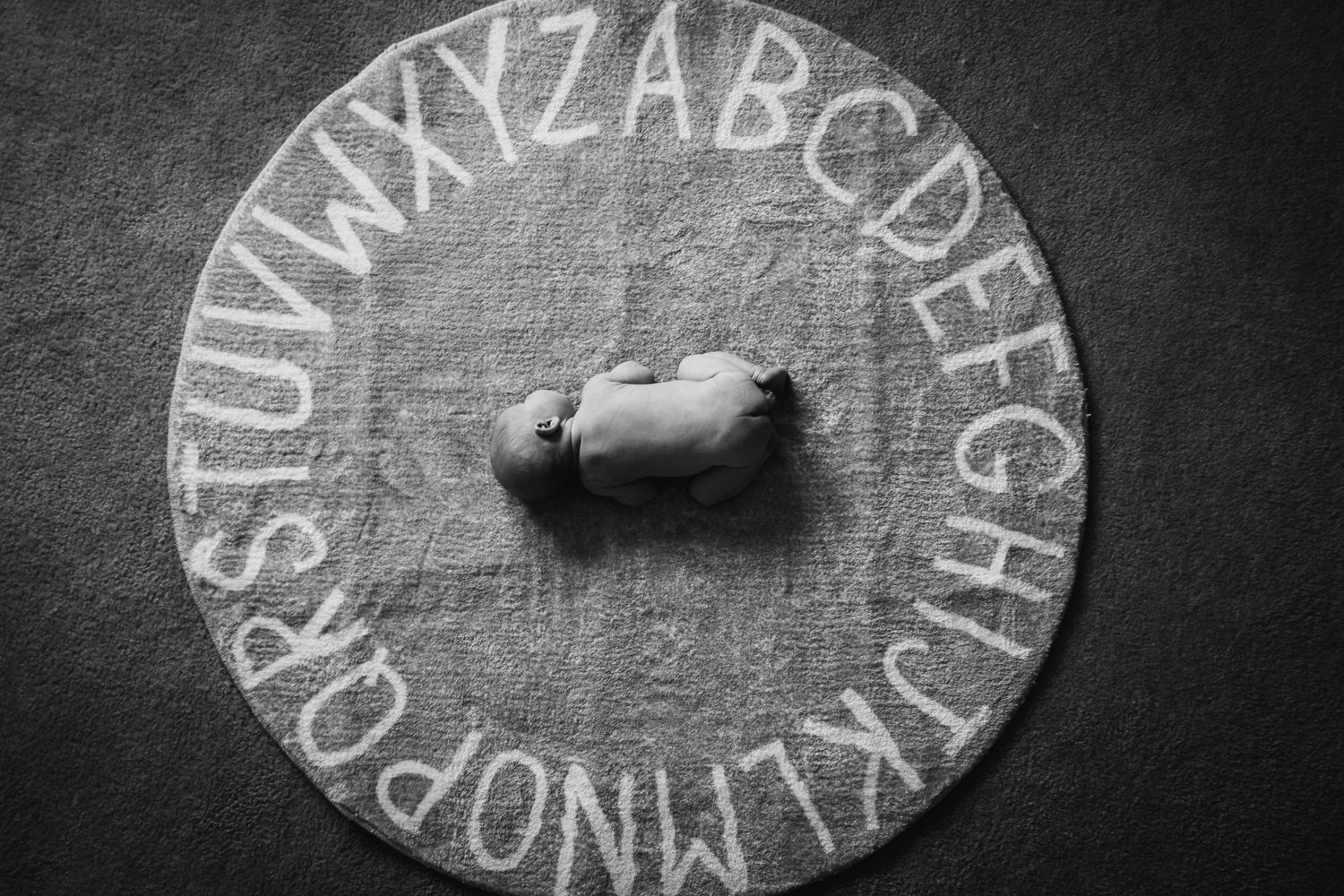 New to the world and new to his adopted family, this little one finds comfort within the walls of his new room.