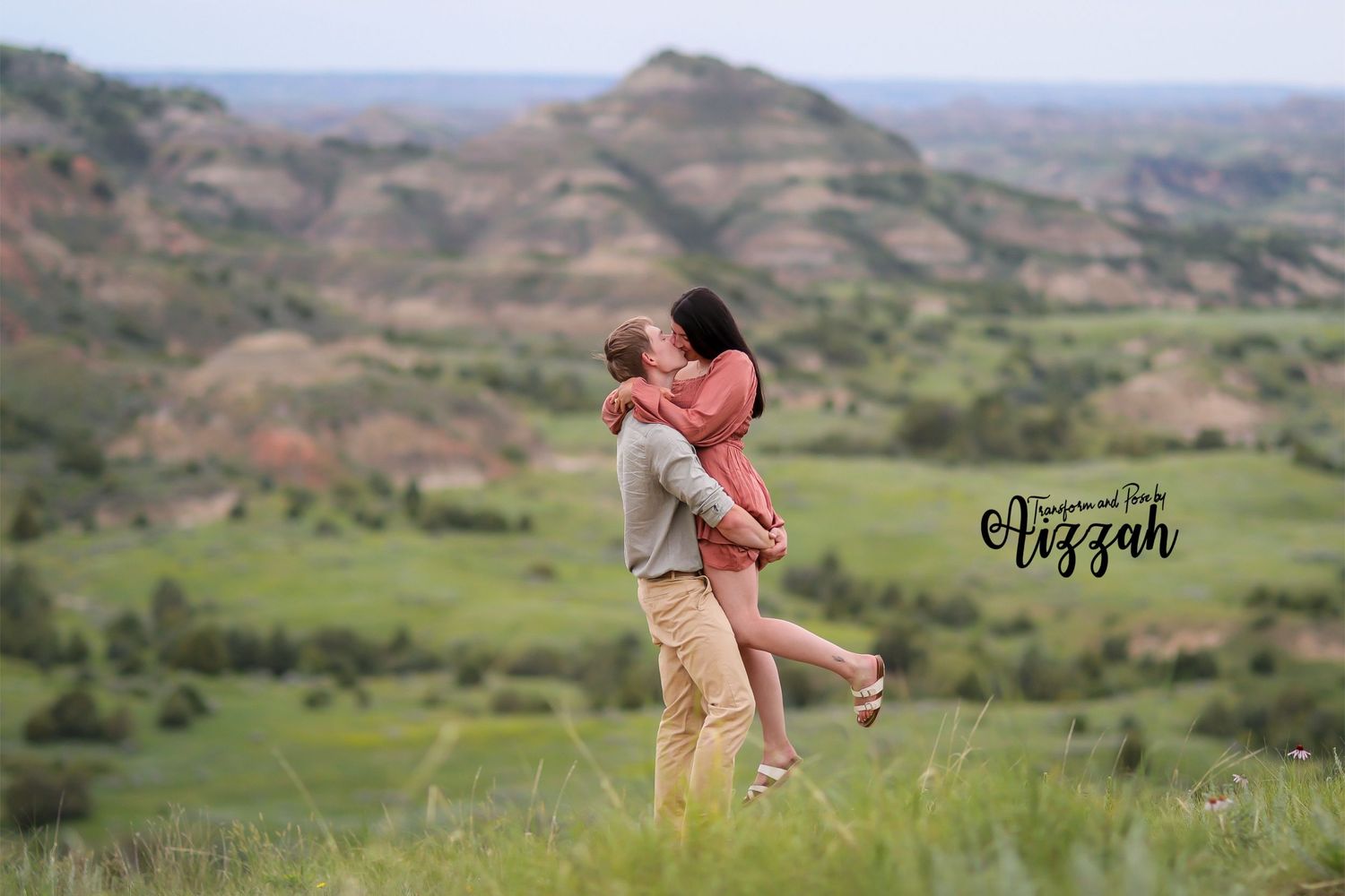 Romantic pair share intimate moments against a scenic mountain landscape.
