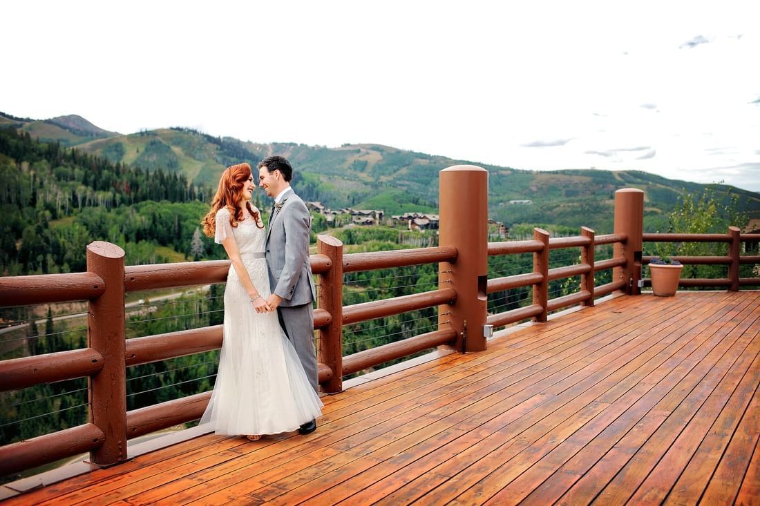 Wedding ceremony at Stein Eriksen Lodge in Deer Valley, Utah. Mountain wedding backdrop