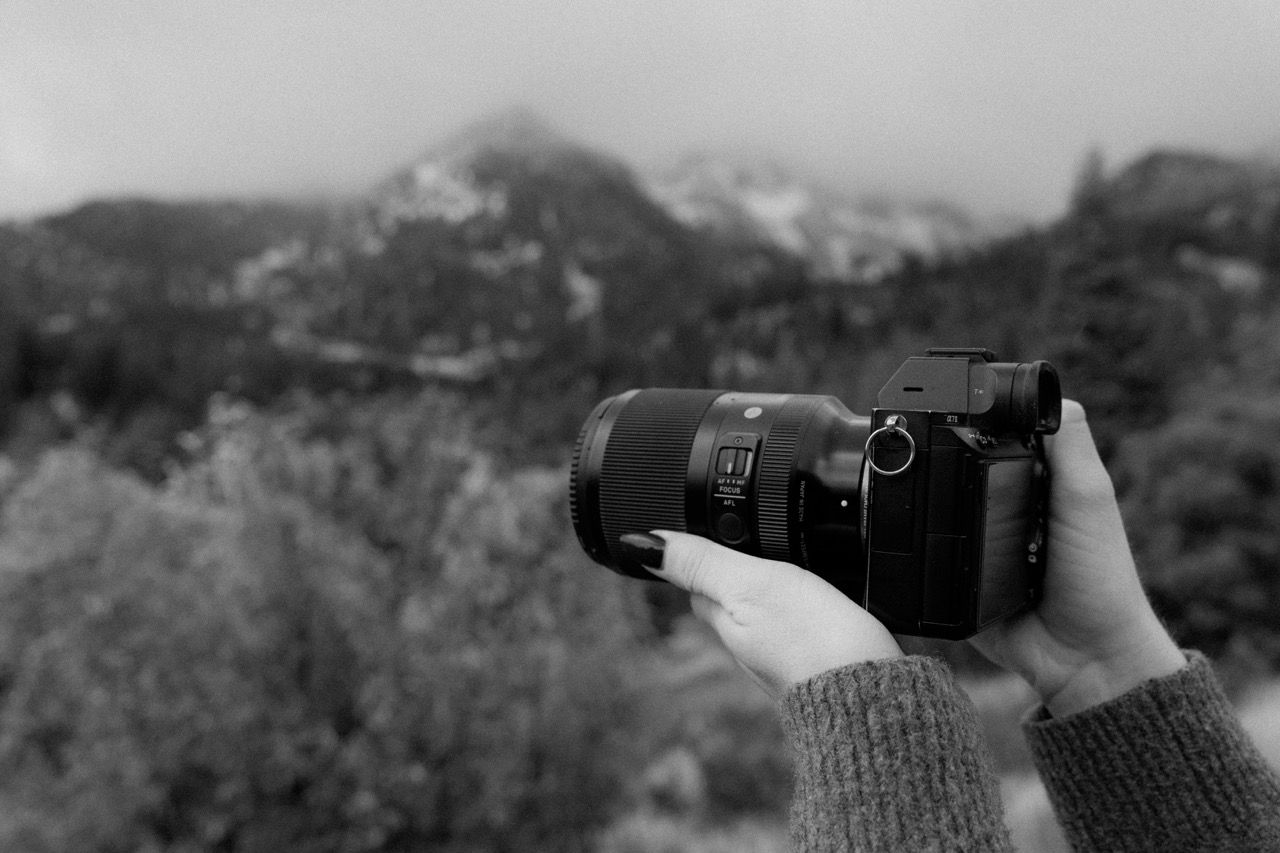 Person holding camera for Jensen Photo & Film wedding photography and videography in Utah