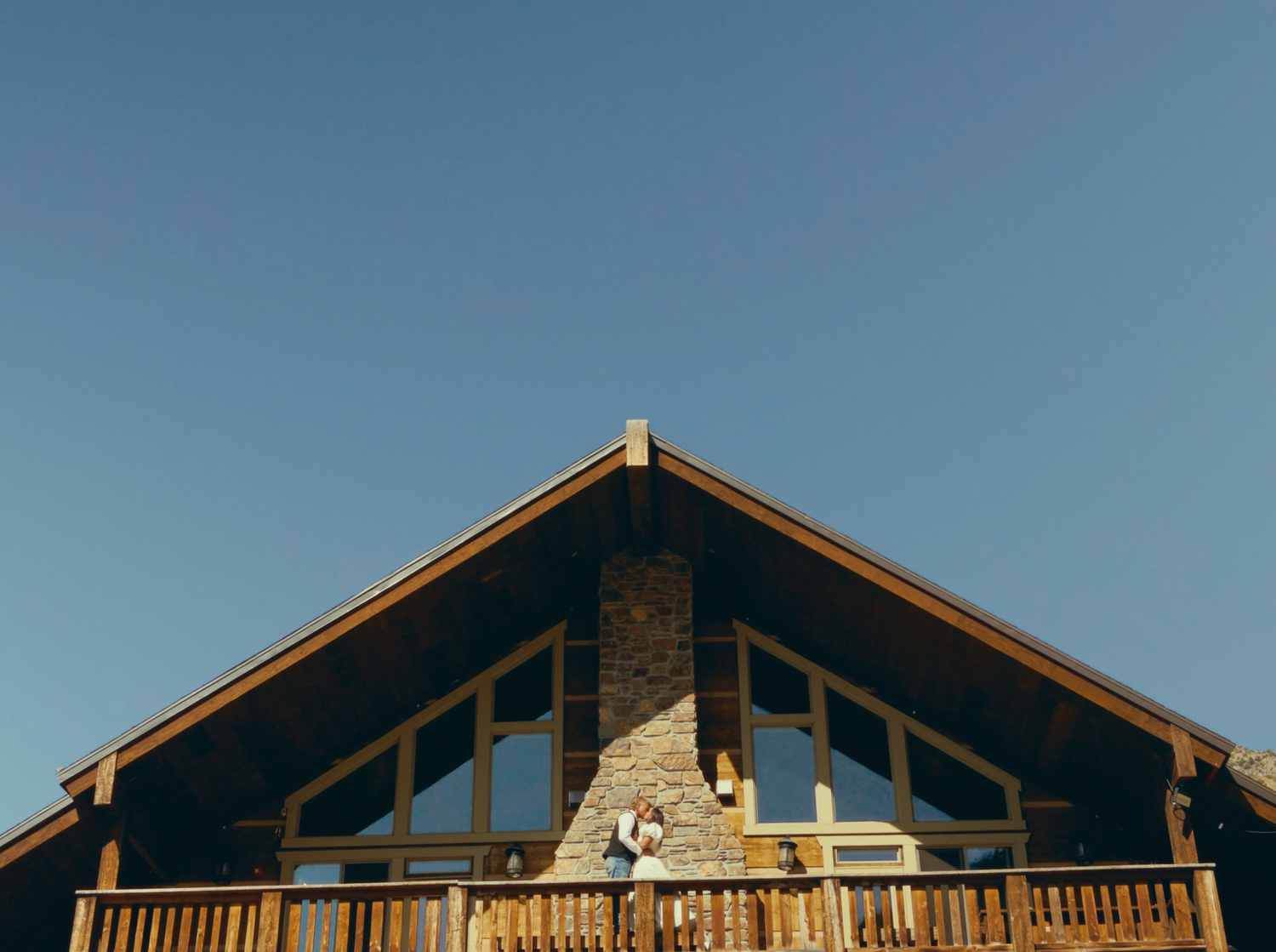 Bride and groom in Utah wedding videography by Jensen Photo & Film. Summer ski lodge wedding.