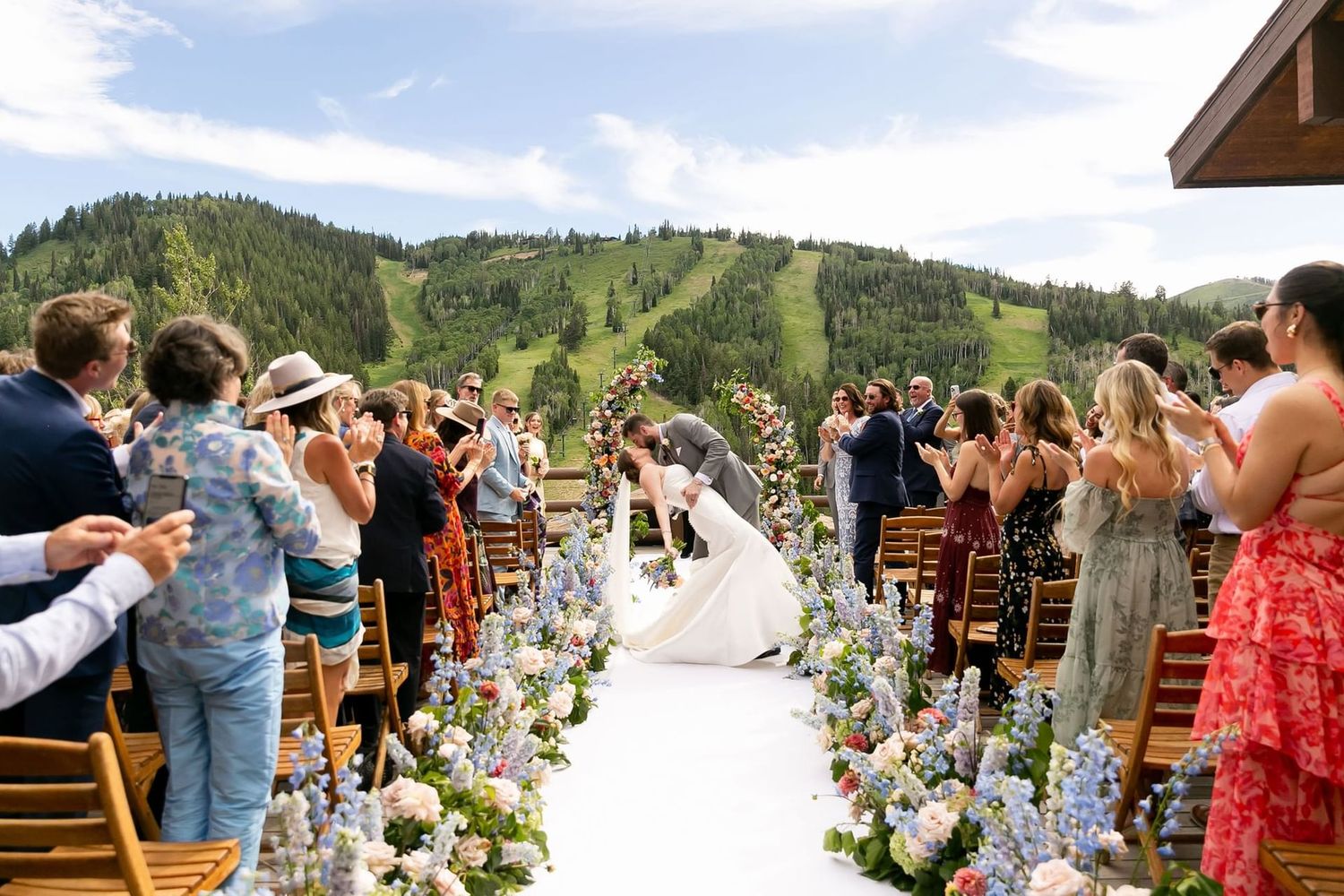 Wedding ceremony at Stein Eriksen Lodge in Deer Valley, Utah. Mountain wedding backdrop