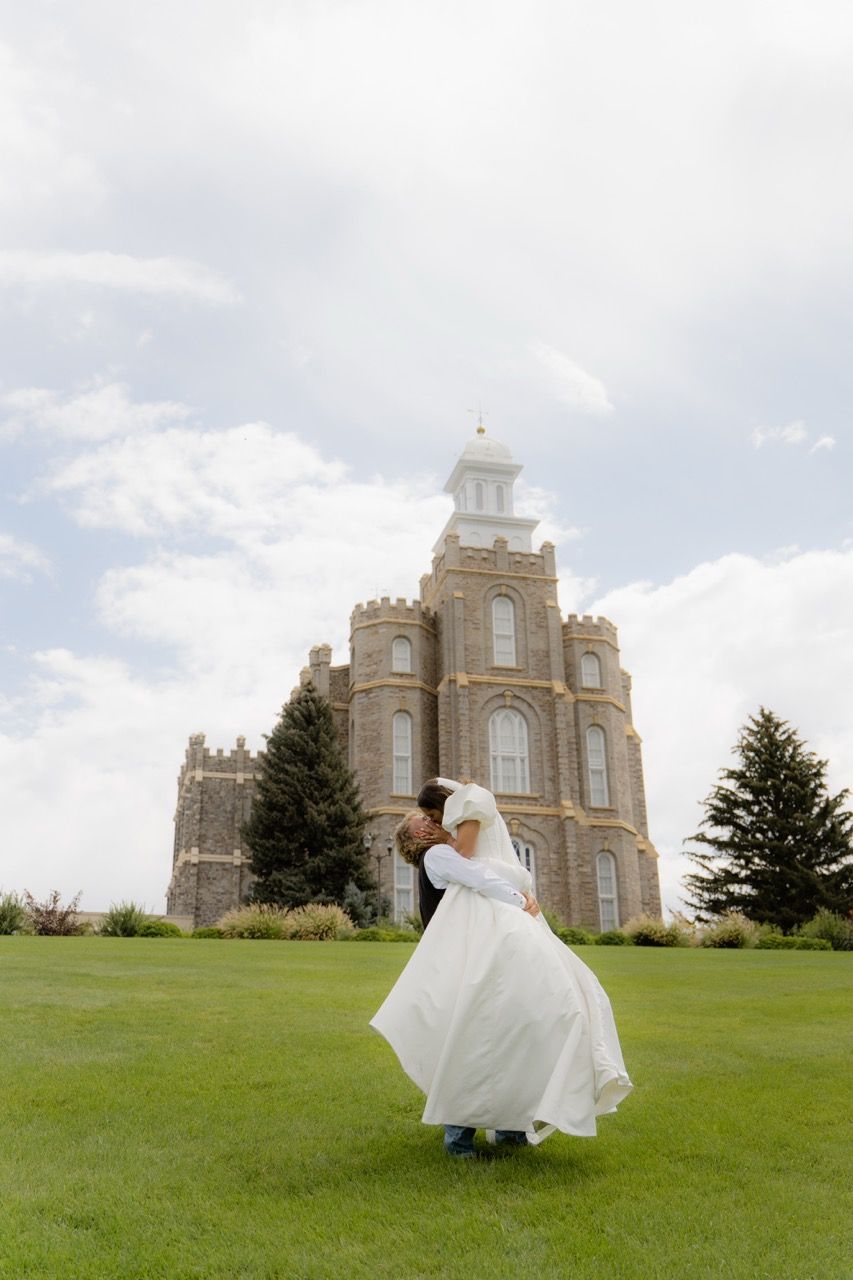 Bride and groom at Logan Temple, Utah wedding photography by Jensen Photo & Film.