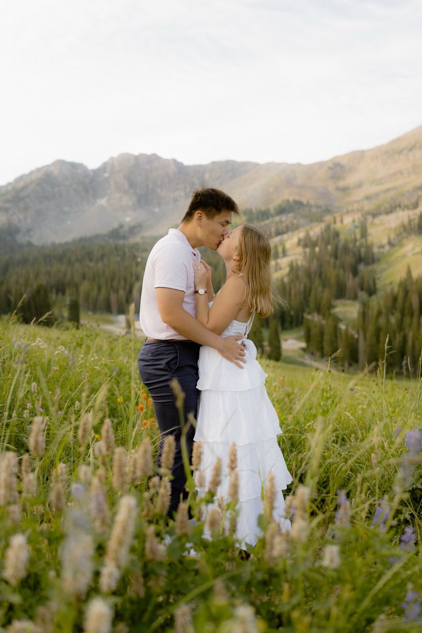 Couple in Utah photographed by Jensen Photo & Film. Wildflower engagement photos.