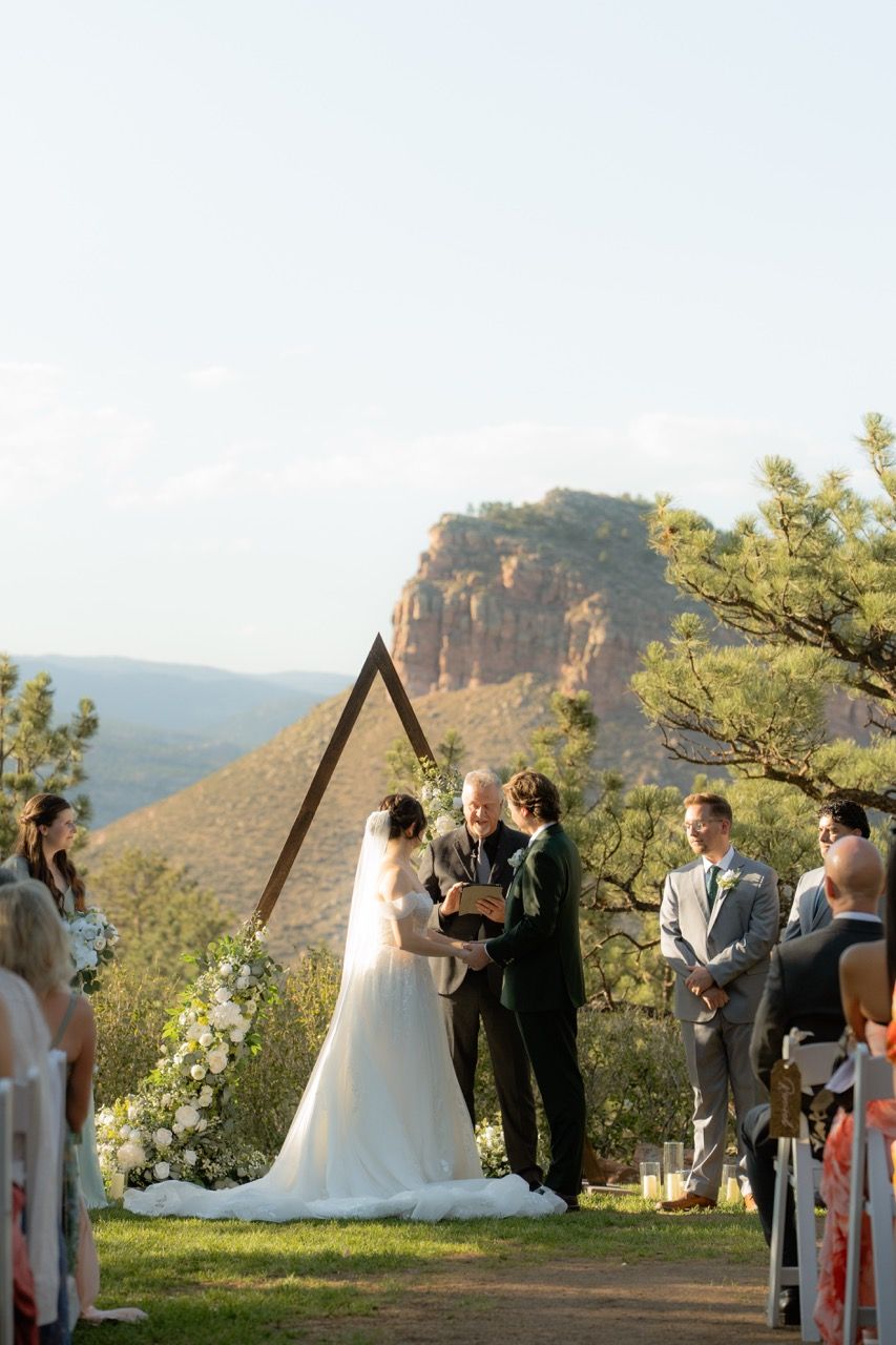Wedding ceremony at Lionscrest Manor in Lyons, Colorado photographed by Jensen Photo & Film