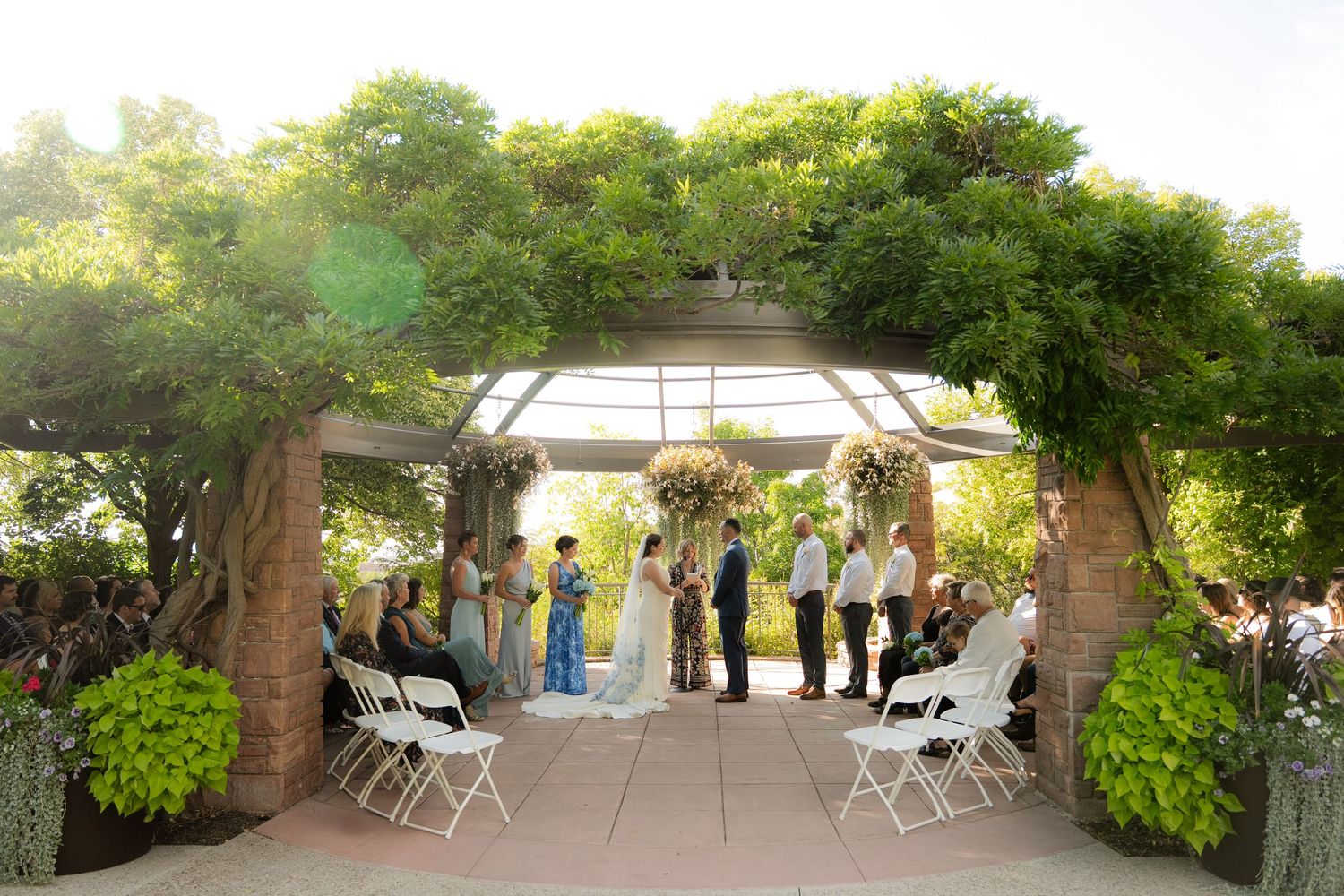 Wedding ceremony at Red Butte Garden photographed by Jensen Photo & Film