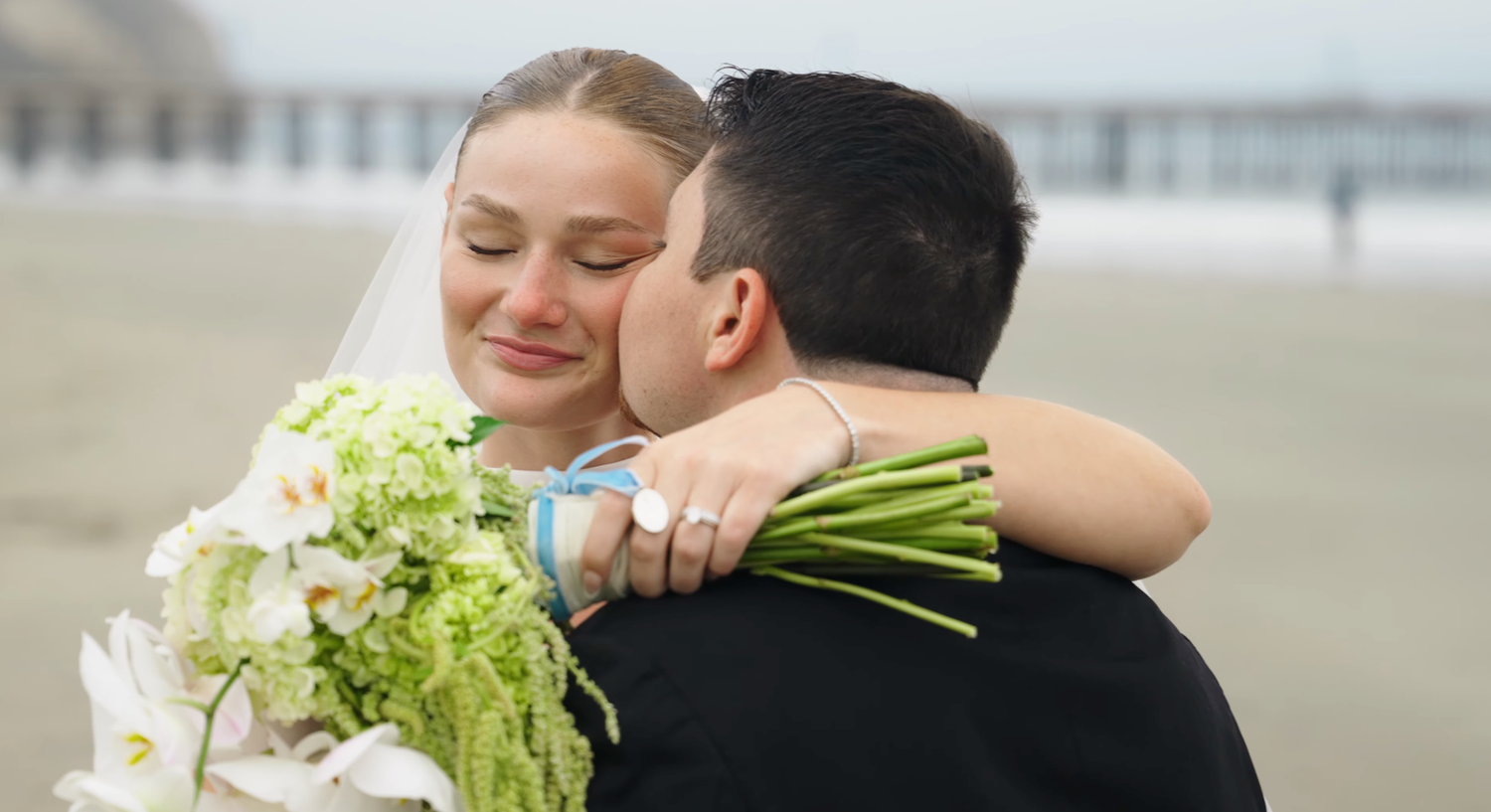 Wedding video of bride and groom on beach in San Luis Obispo, California captured by Jensen Photo and Film