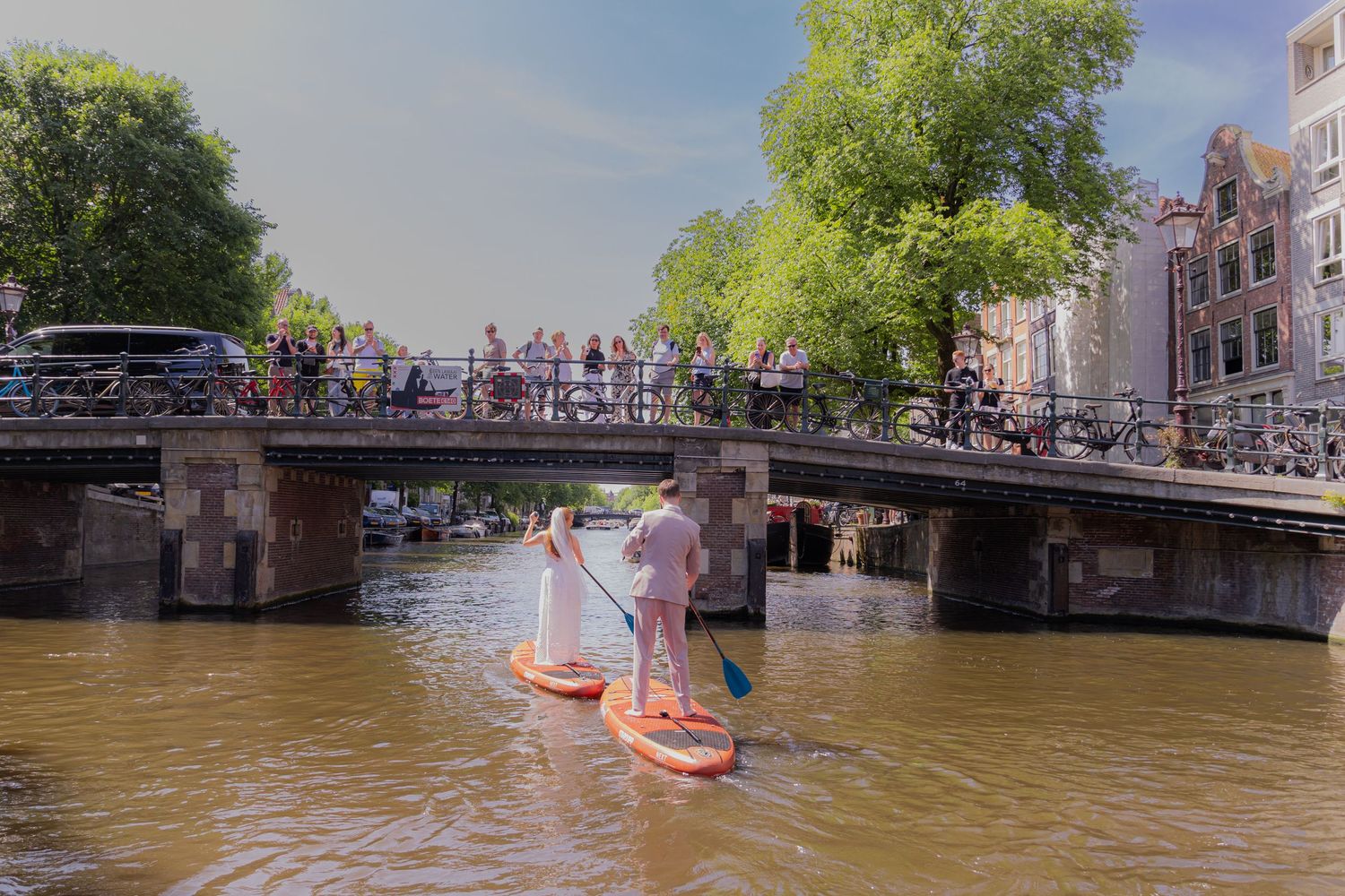 Series of canal views in Amsterdam with boats and historic bridges.