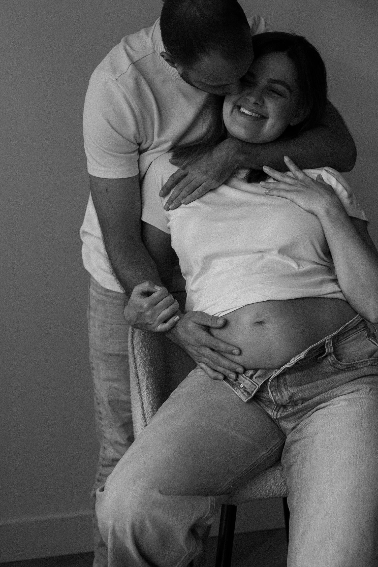 Black and white artistic photography series showing intimate body details in denim and white clothing.