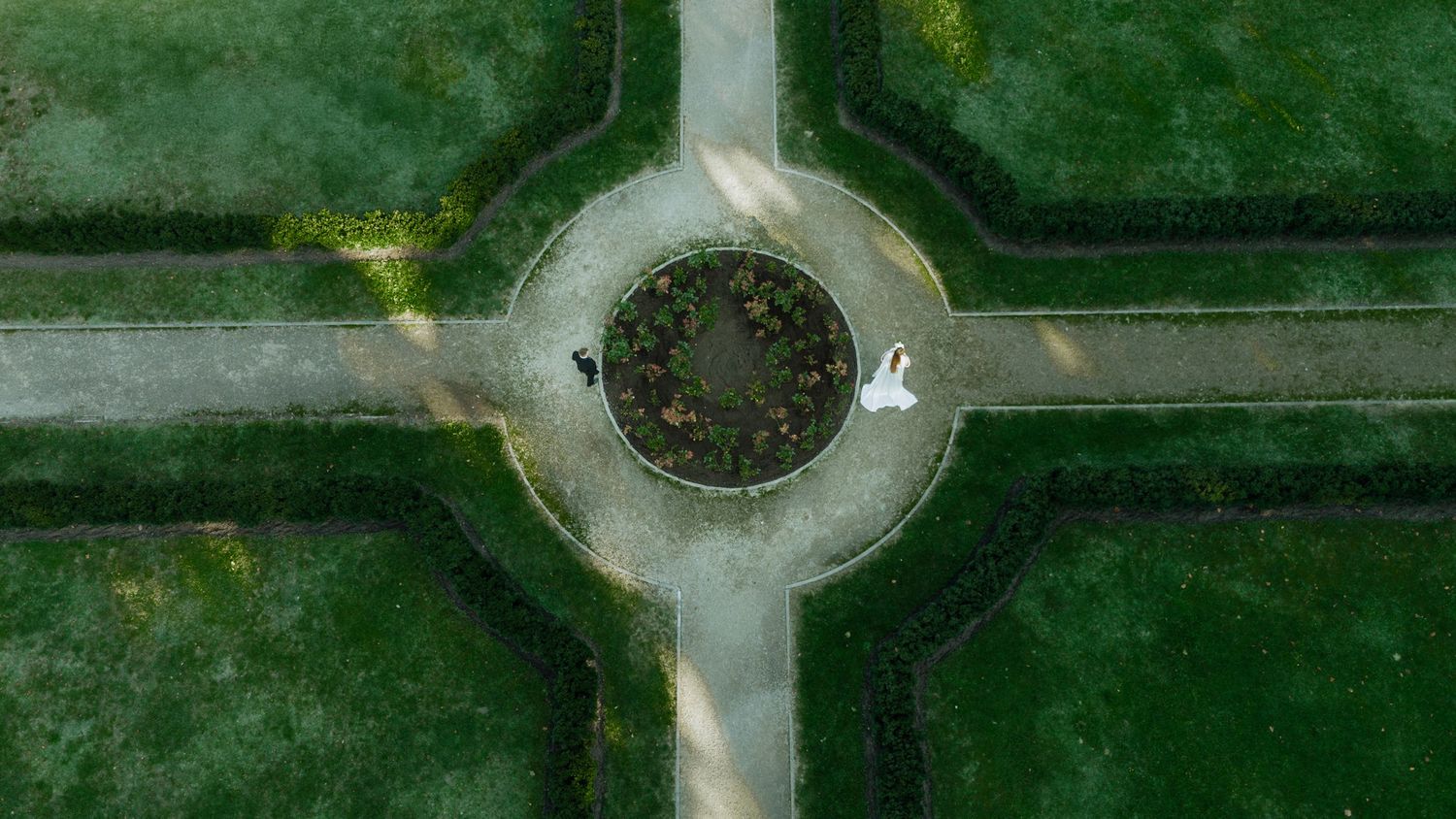 Aerial view of geometric garden pathways and landscaping patterns.