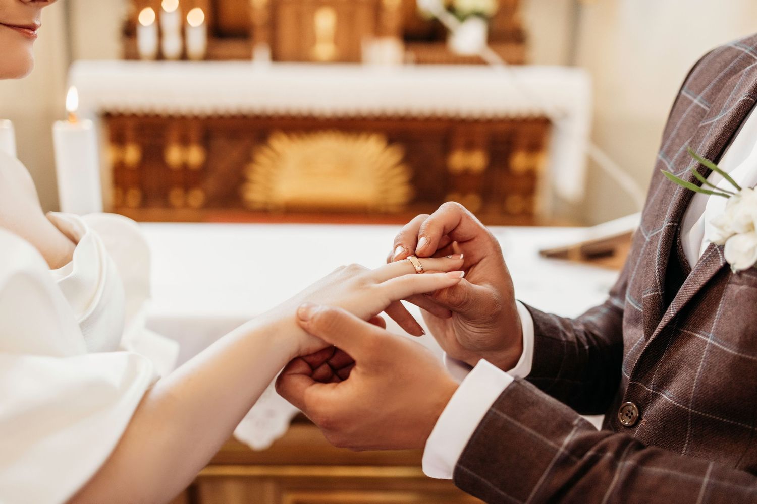 Elegant wedding celebration scene with guests toasting and clinking champagne glasses at a reception.