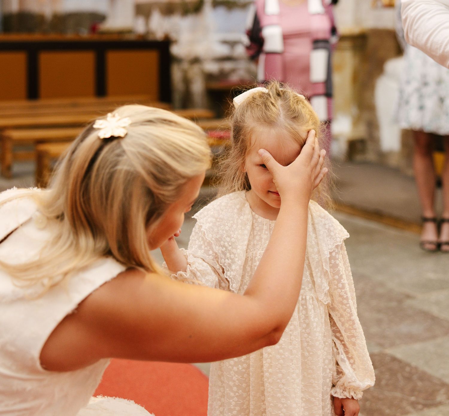 A series of candid shots showing a child in a white lace dress twirling and playing in natural light.