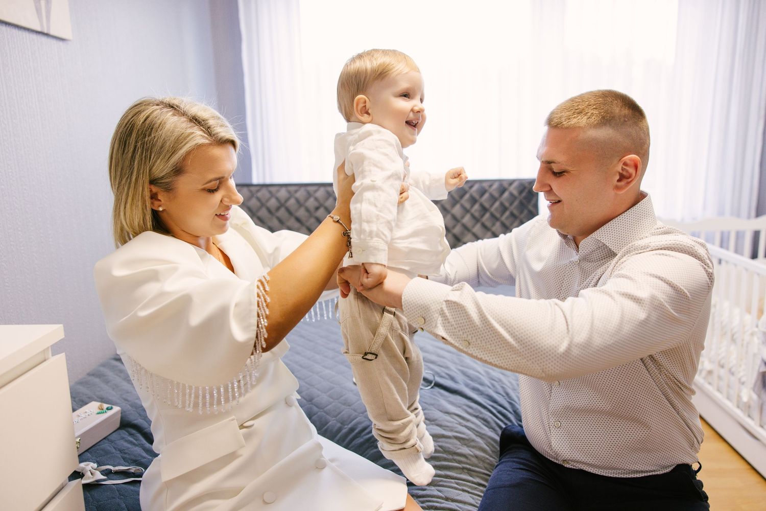 A sequence of self defense training moves being demonstrated by two people in white clothing.