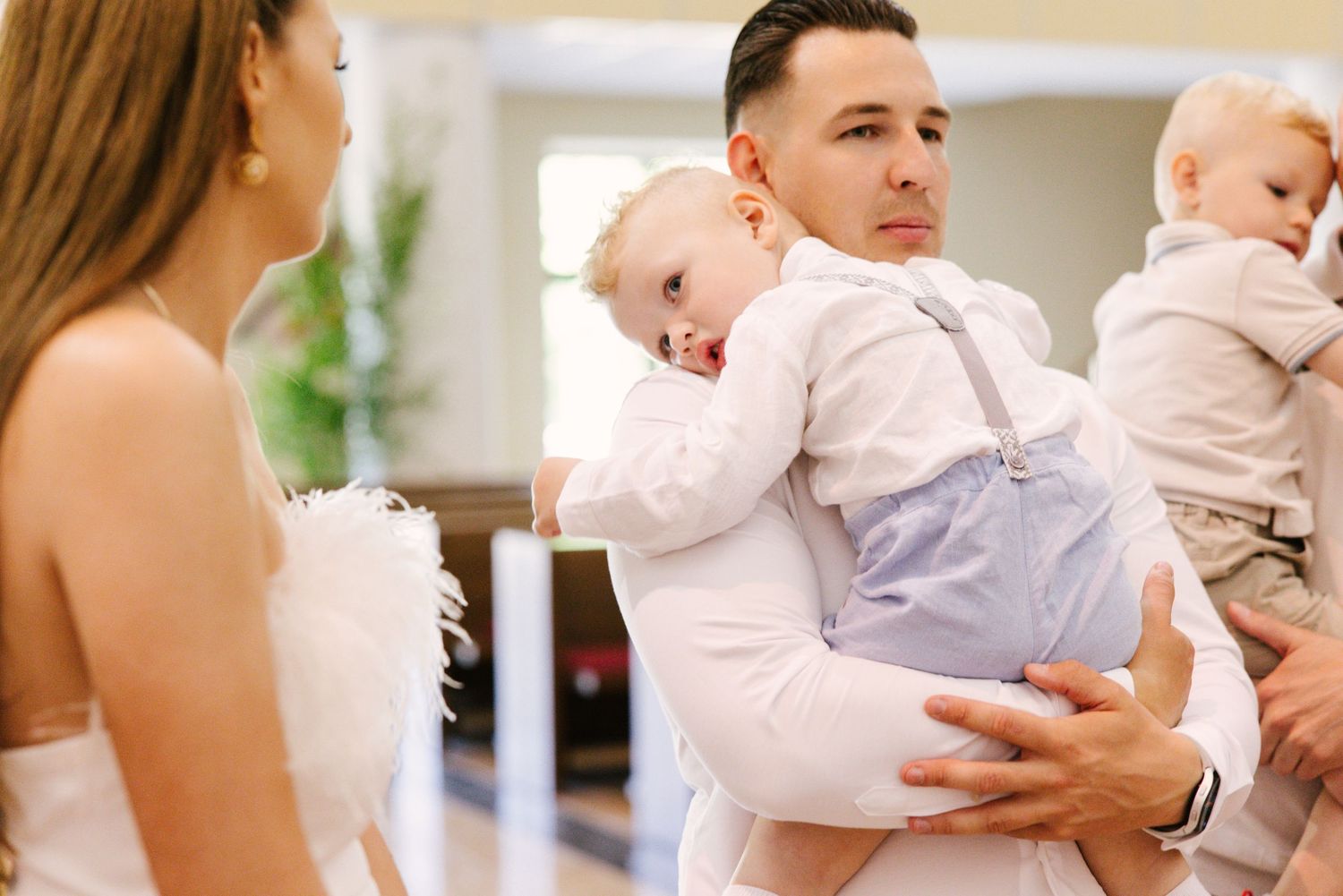 Intimate family moments captured in a series of warm indoor portraits.
