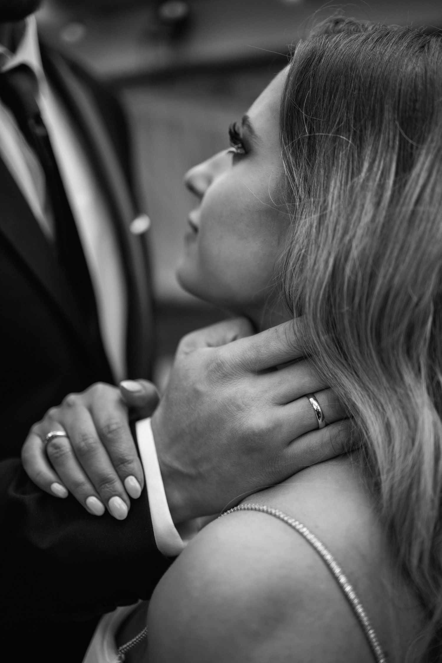 Black and white close-up series showing tender romantic moments between a couple.