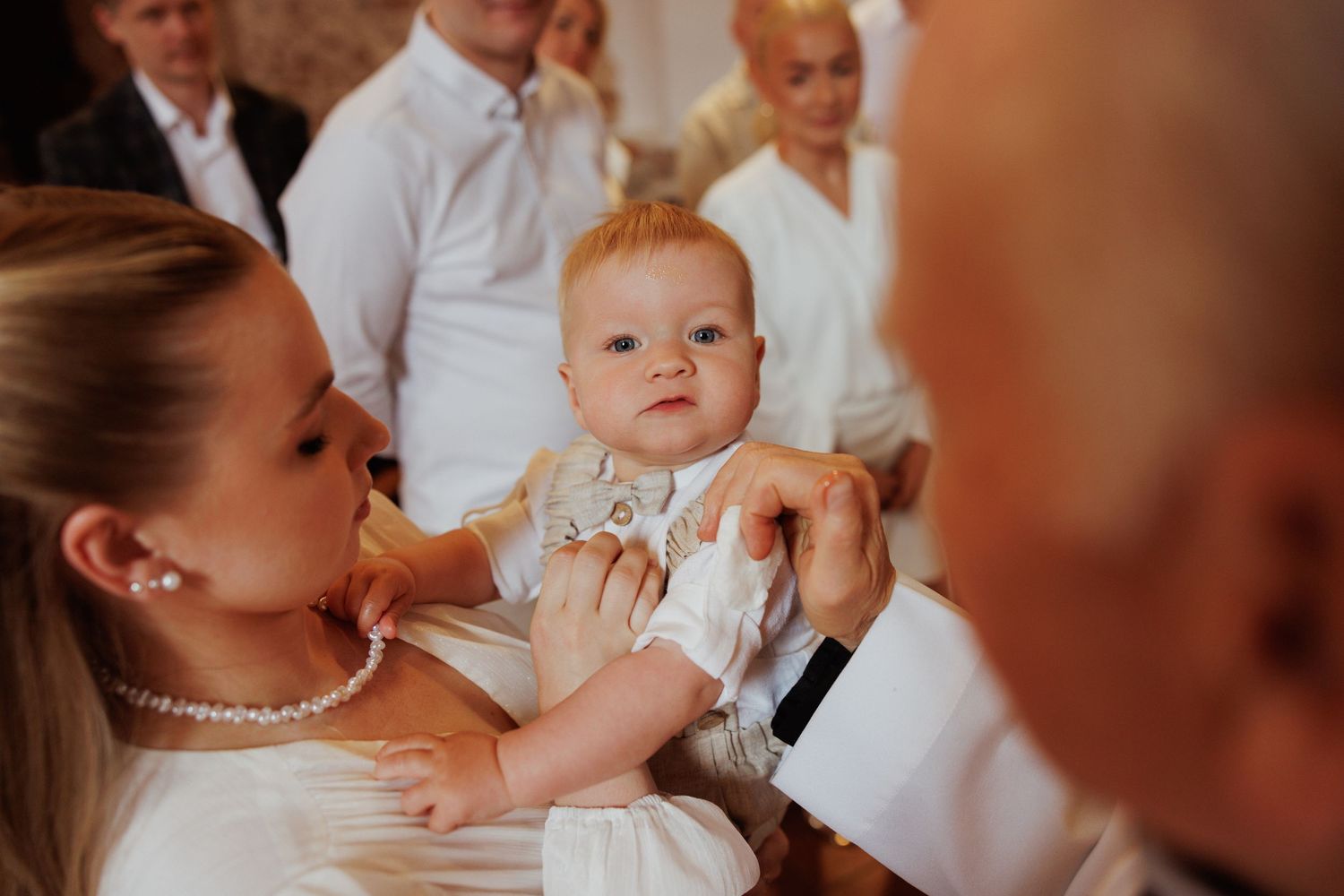 Close-up candid shots of tender moments during a wedding celebration.