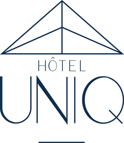 Navy blue geometric hotel logo for Hôtel UNIQ featuring a triangular sail-like emblem.