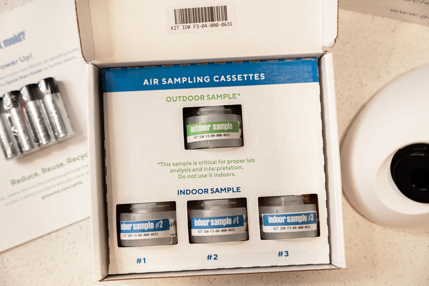 Got Mold air sampling cassettes kit open showing outdoor and indoor sample containers in packaging.