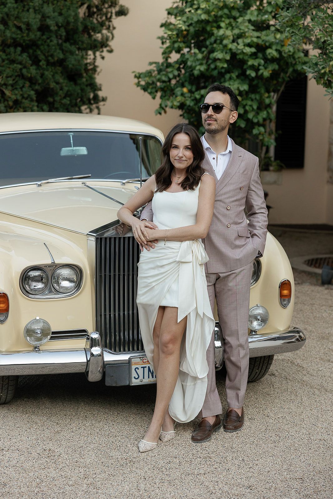 Welcome Party Bride and Groom in front of a classic car at Stonepine Estate.