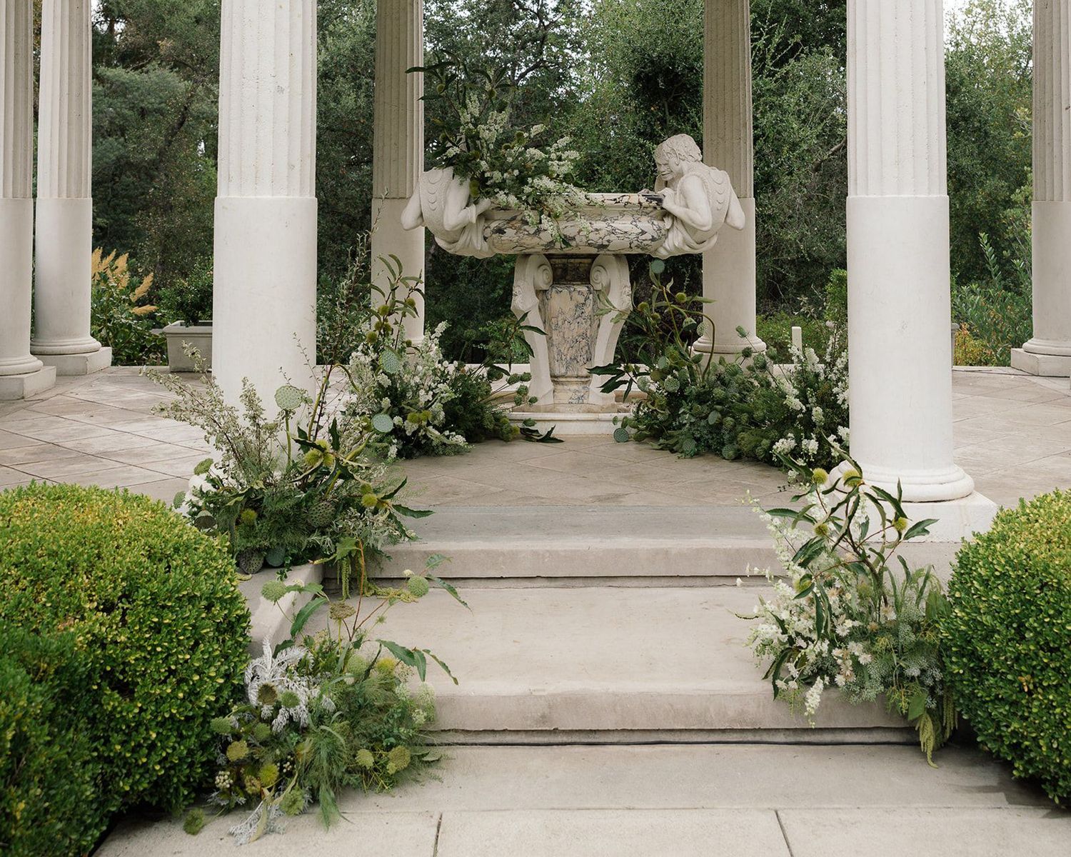 Wedding ceremony photography showcasing floral design at Montalvo Art Center in Saratoga, California.