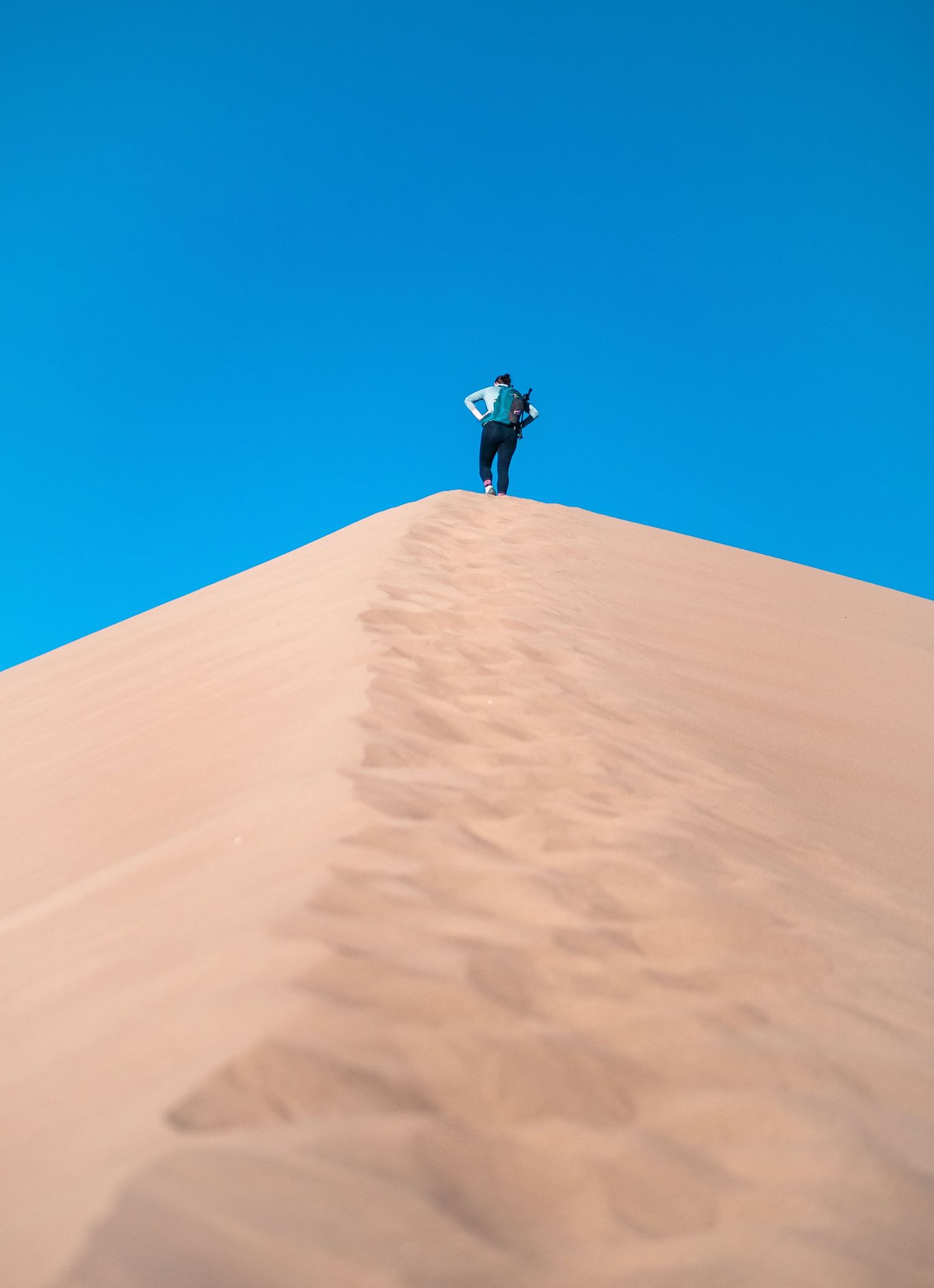 Atop the sandpit she goes. Colorado Great Sand Dunes National Park during Summer 2024.   © Jack Curtis Photography.