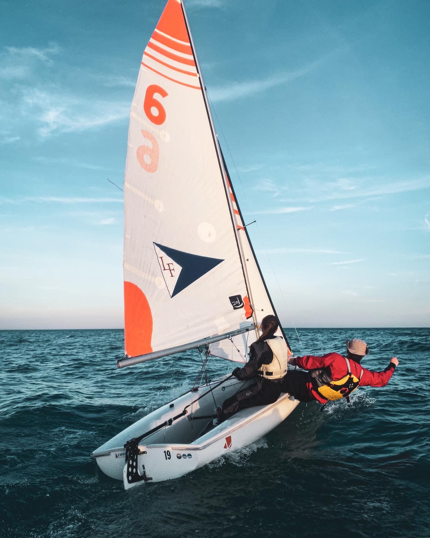 Lean into the Spray. Lake Forest College Sailing Team during Fall 2022. © Jack Curtis Photography.